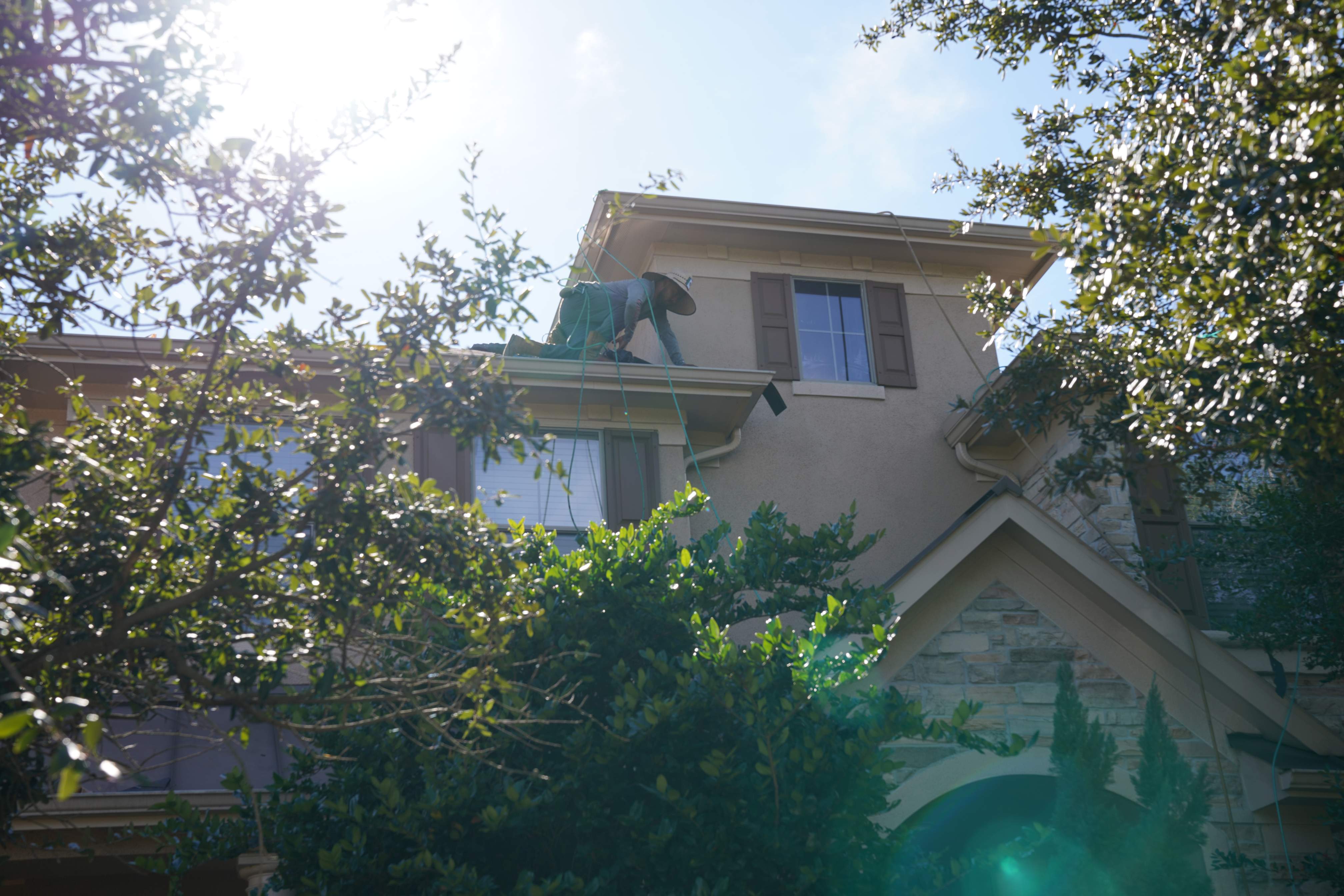 Two-Story Roof Replacement & Chimney Stucco Repair — Houston, TX by PL Roofing & SB Roofing, LLC.