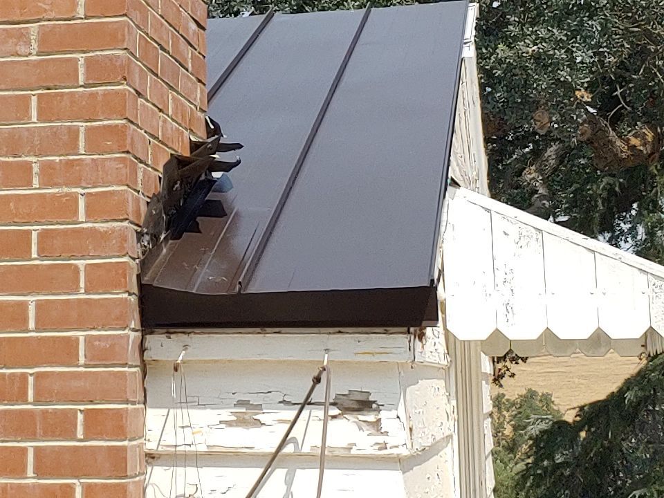 Residential Roofing Installation using Standing seam metal roofing system by Straight Edge Roofing Inc