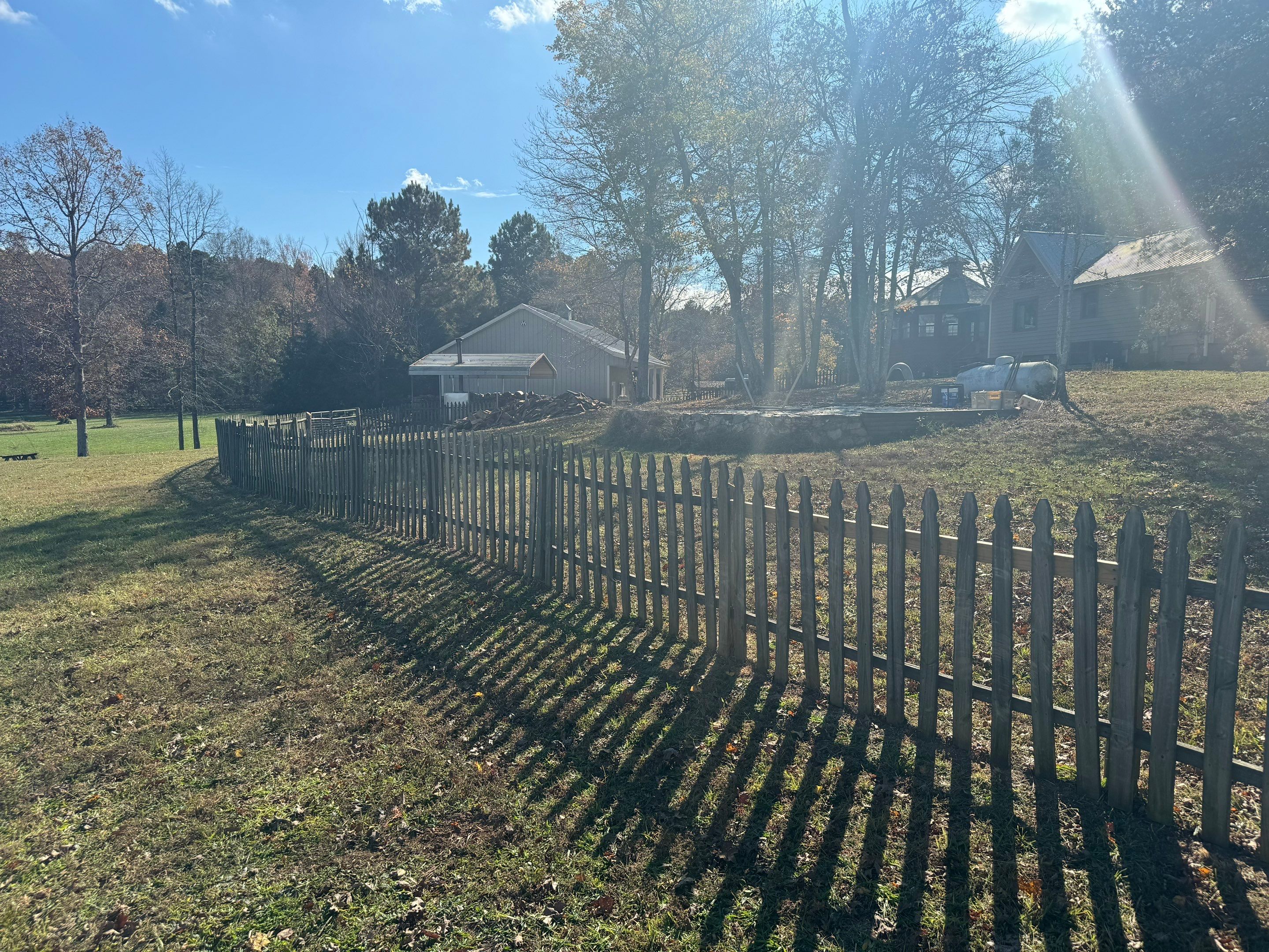 Fence Staining (Farm in Durham NC) by GonzalezPainters & Contractors Inc 