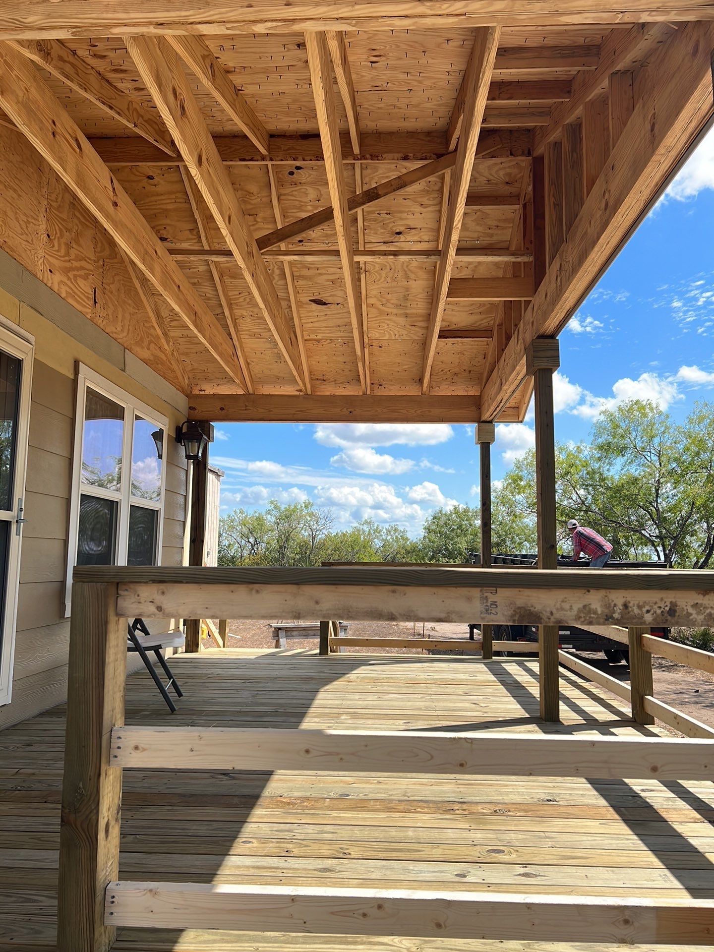 Front Porch Sitt'n by Bayfront Roofing and Construction