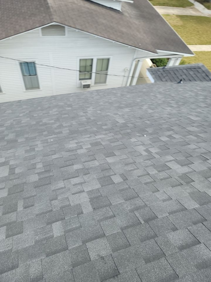 Residential Roofing Installation using Roof Replacement by American Roofing & Construction LLC