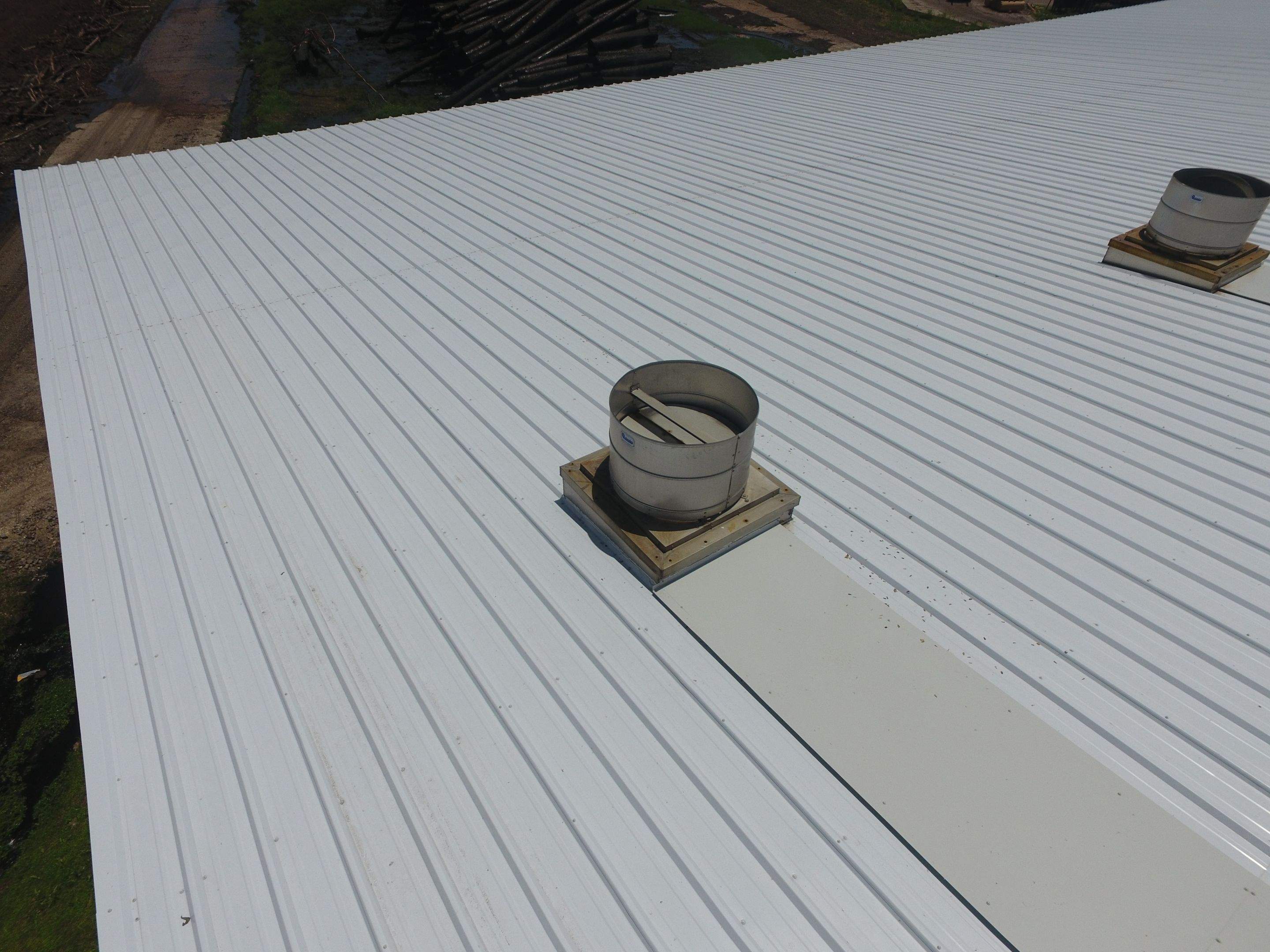 Commercial Roofing Installation using Aluminum Roofing panels by Hostetler Roofing