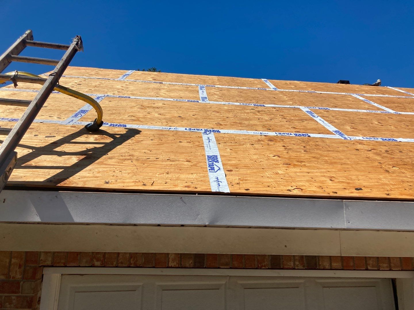 Residential Roofing Installation using Roof Replacement by American Roofing & Construction LLC
