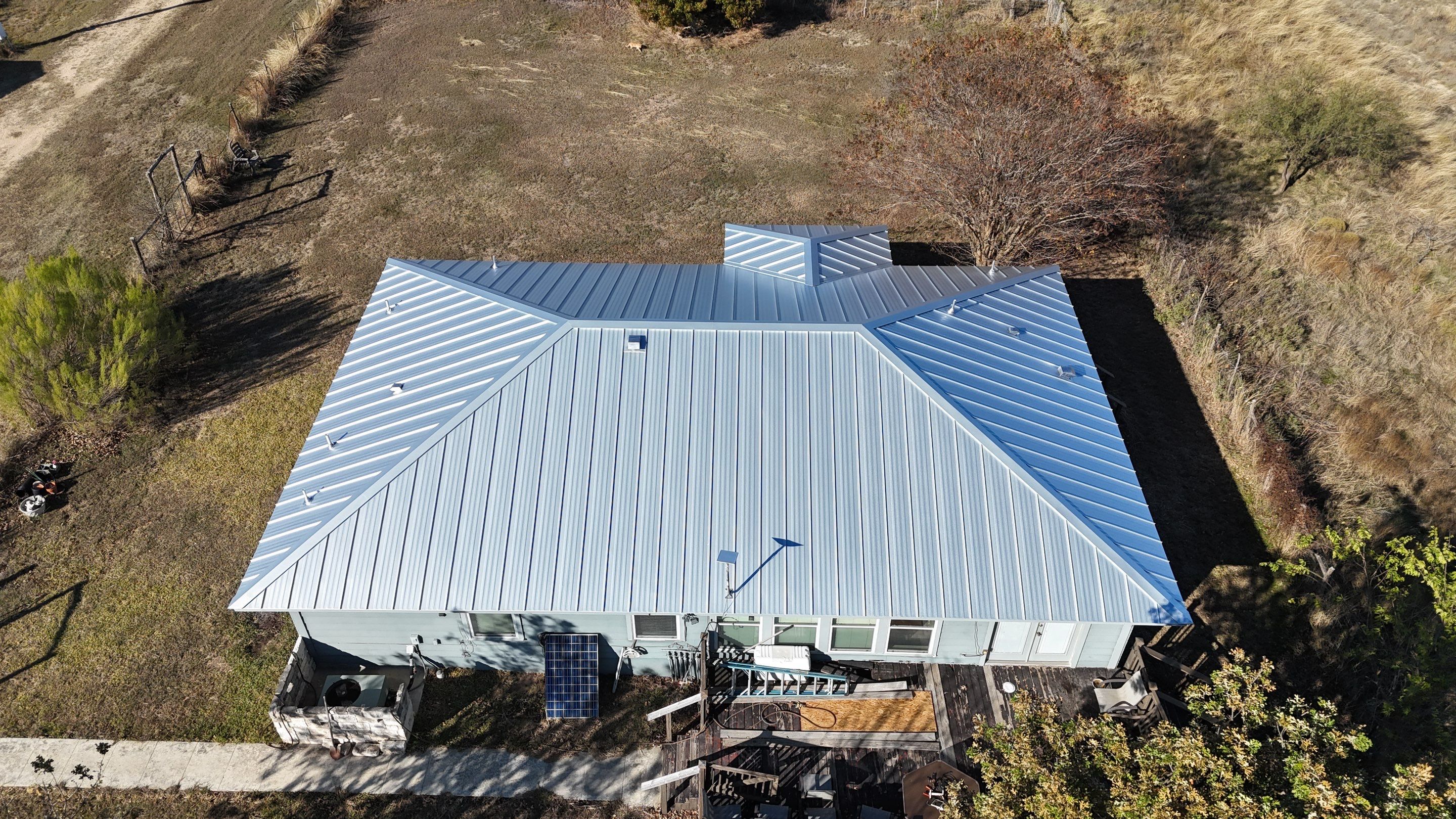 Residential Roof Replacement using 24 GA Standing Seam by Action Exteriors Austin