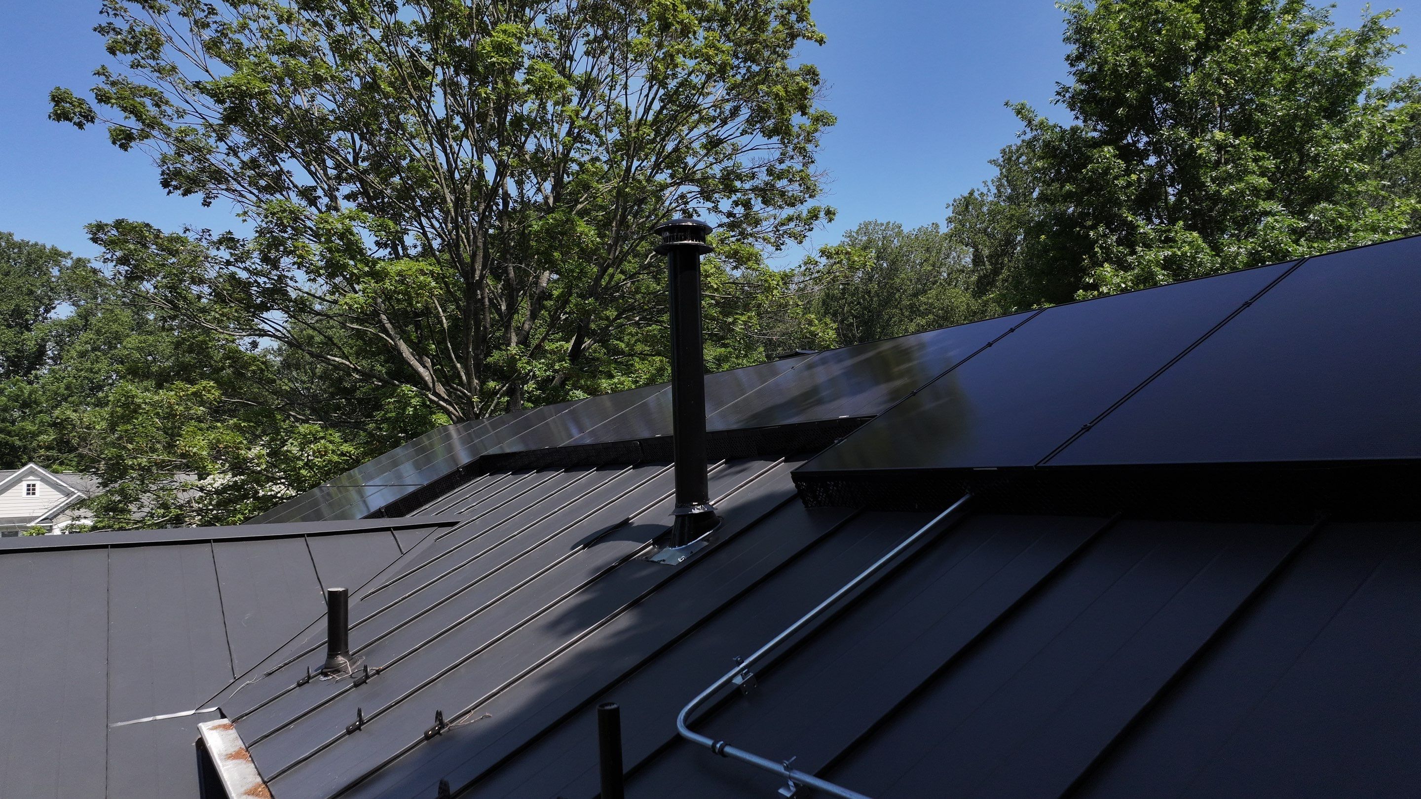 Metal Roof + REC Panels: A Solar Upgrade by American Home Contractors