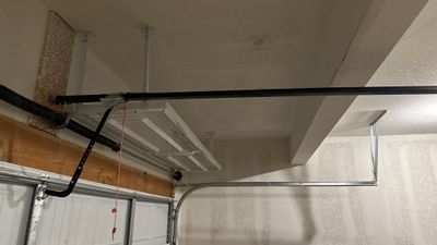 Dillon C added these overhead racks to his garage