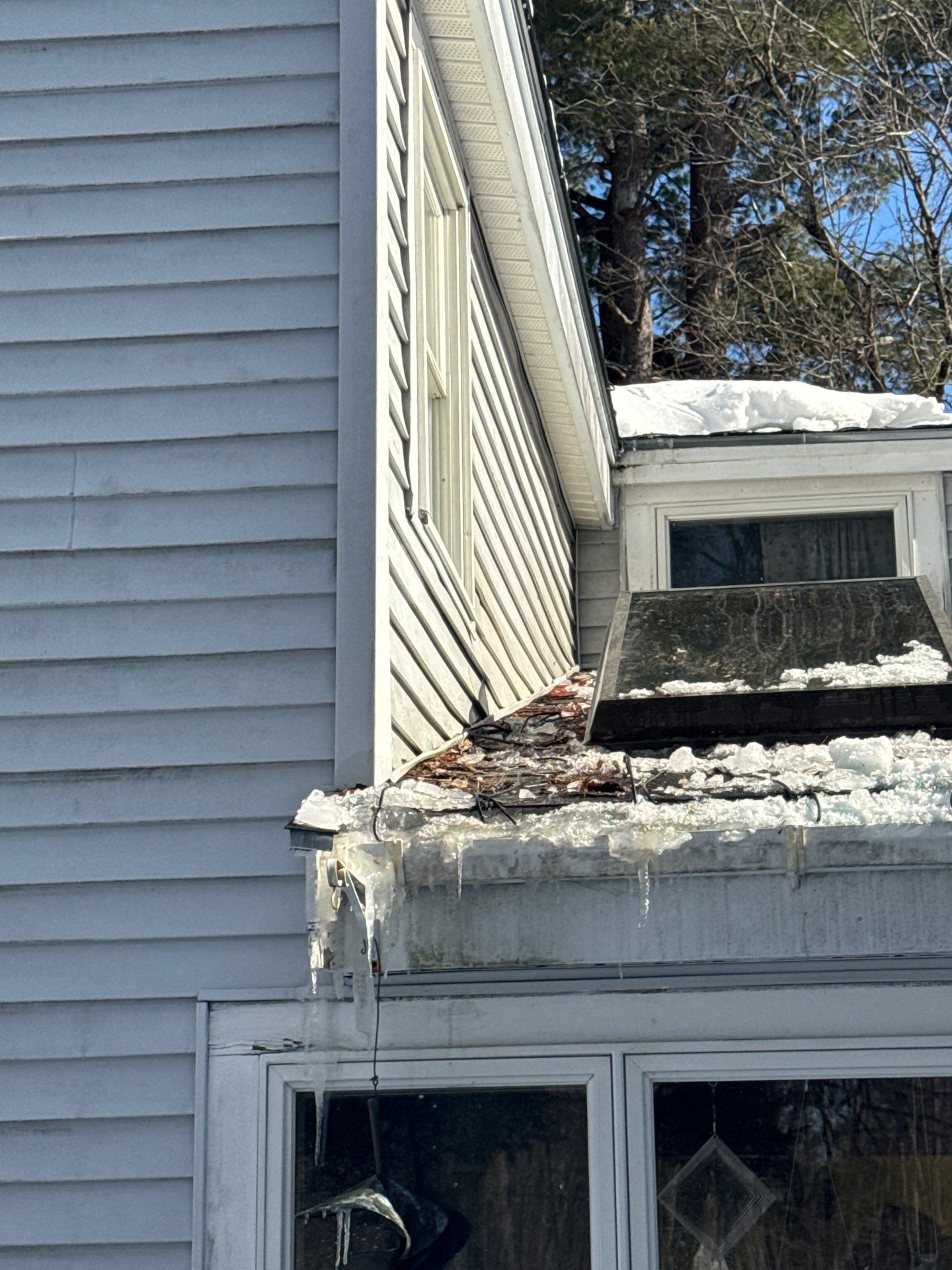 Ice Dam Removal, Snow Removal & Sidewall Flashing Repair in Acton, MA by Mighty Dog Roofing of Greater Middlesex County