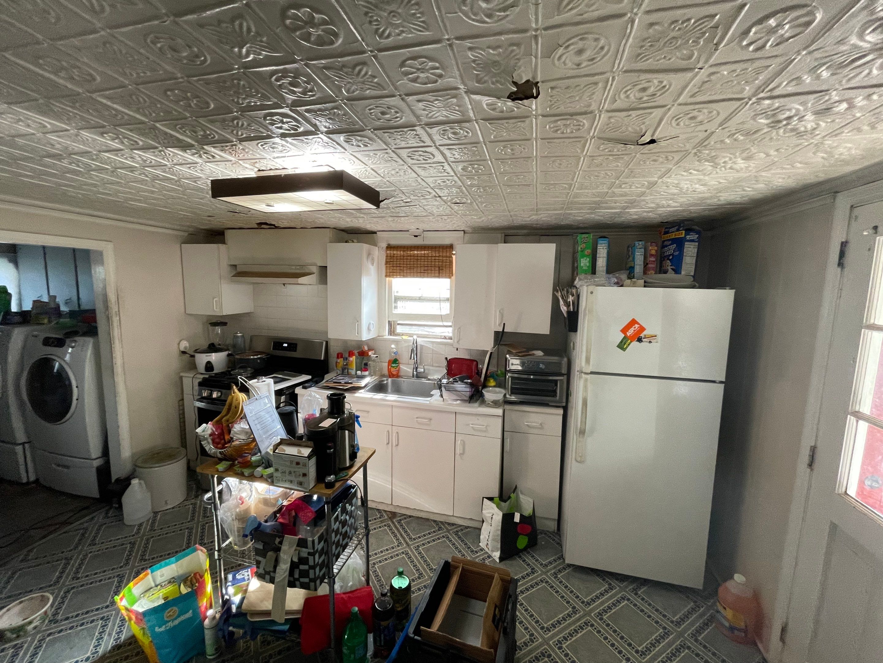 Kitchen Remodel using White Shaker by Home Concepts Construction