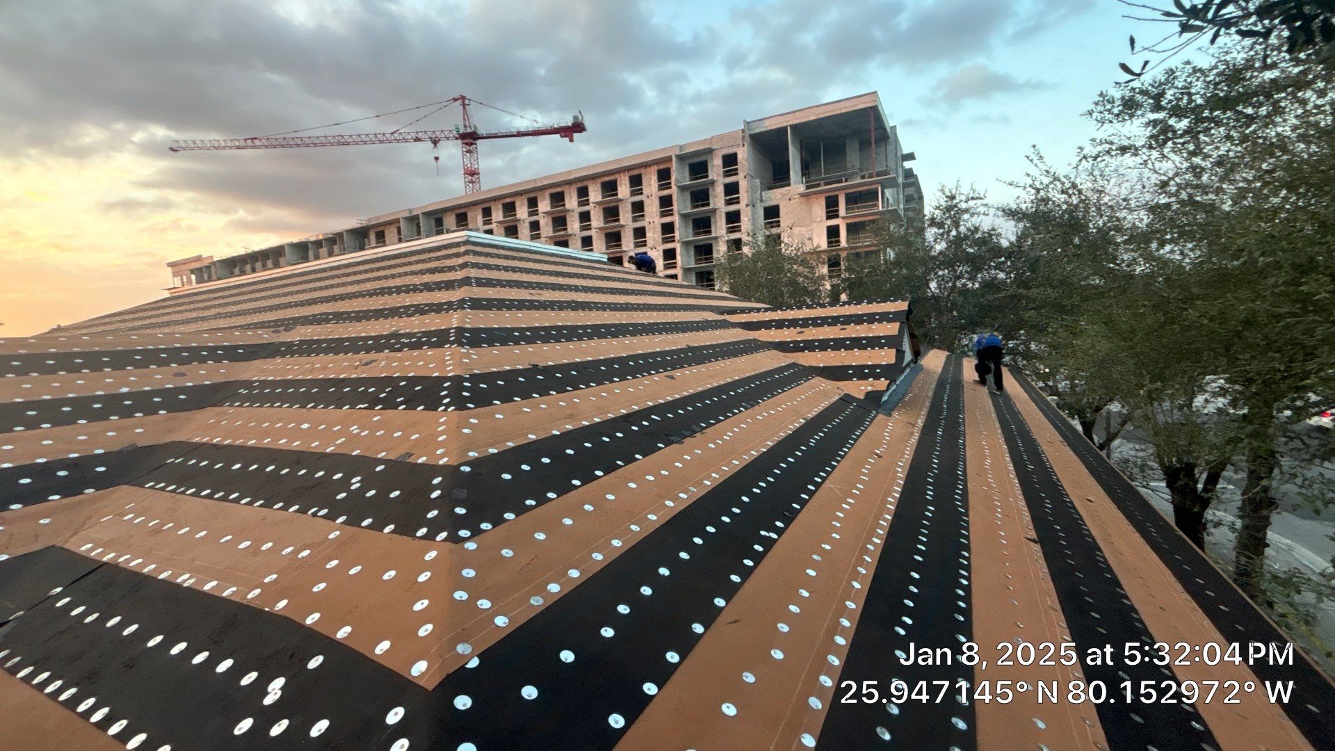 COMMERCIAL REROOF 24 GUAGE MEDIUM BRONZE 1-1/2" MECHANICAL SEAM "ZEBRA METHOD" by Earl W. Johnston Roofing 