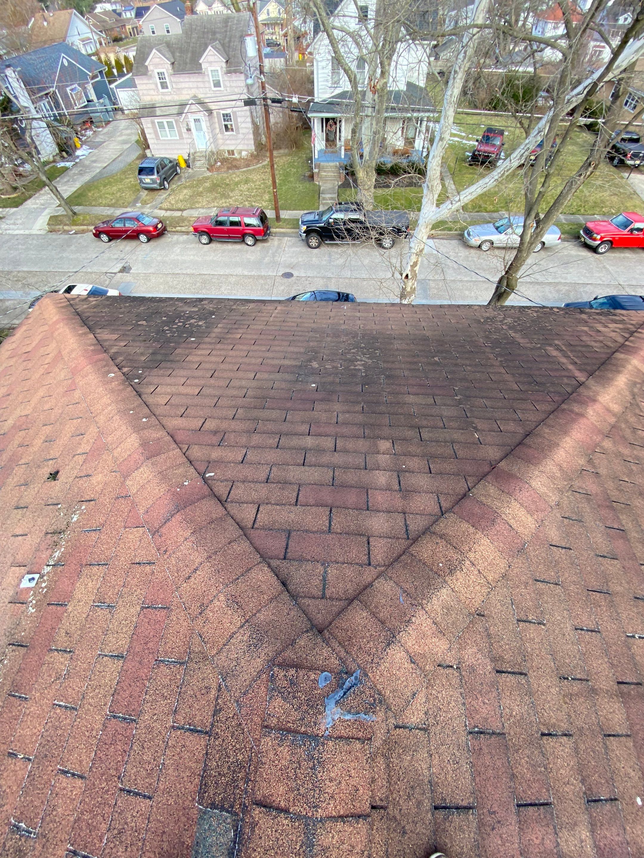 Moire Black Shingles by Reimagine Roofing