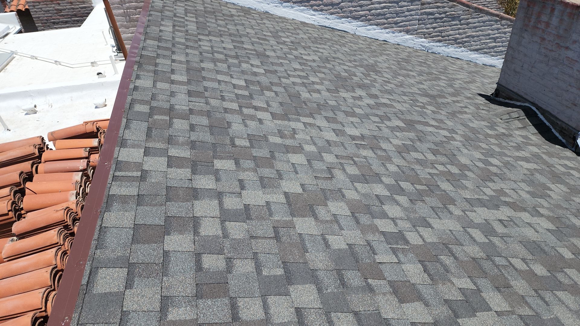 Estate Gray Shingles by Reimagine Roofing