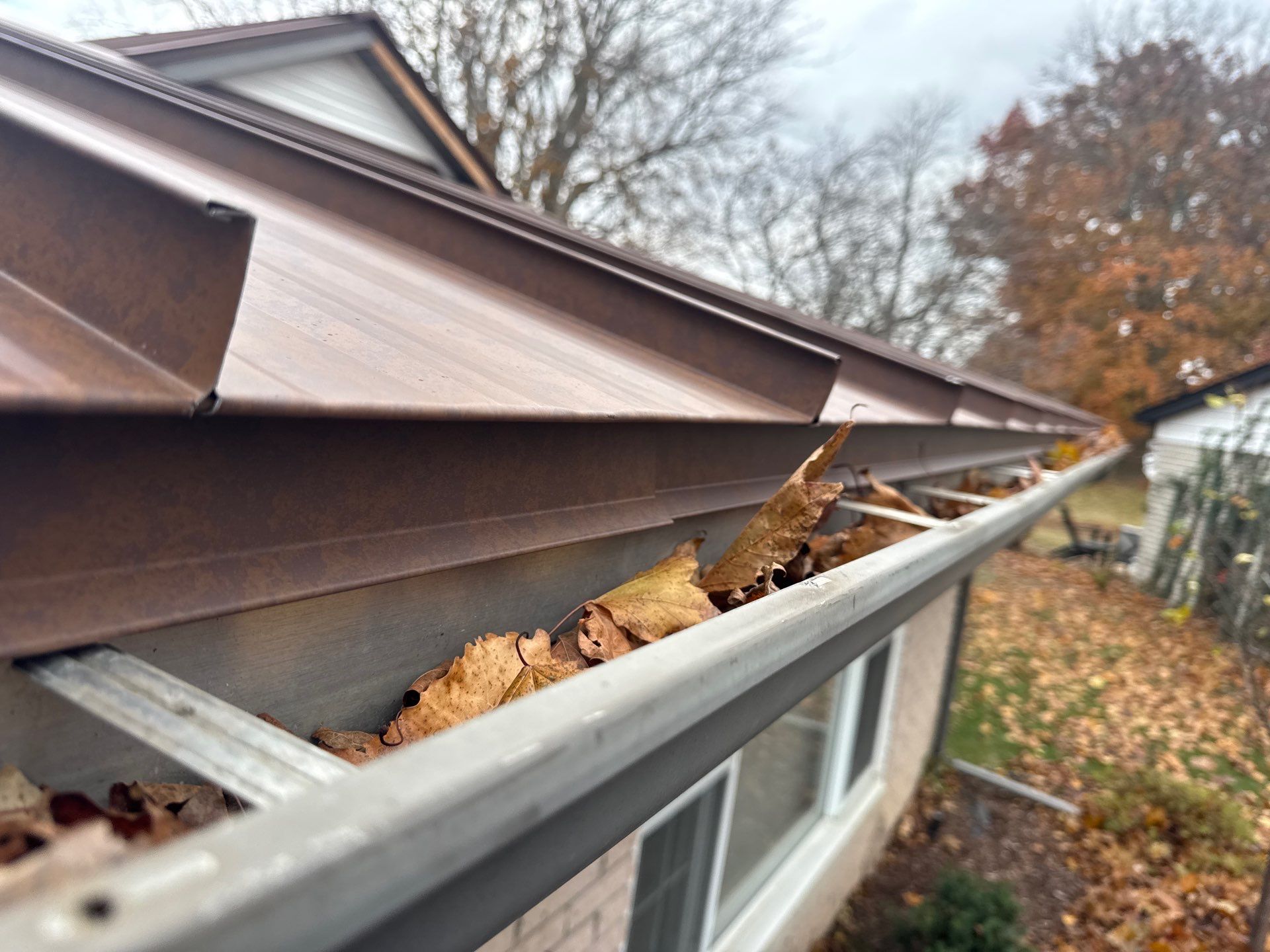 Roof Replacement using MS Standing Seam Roof Western Rust by 180 Contractors