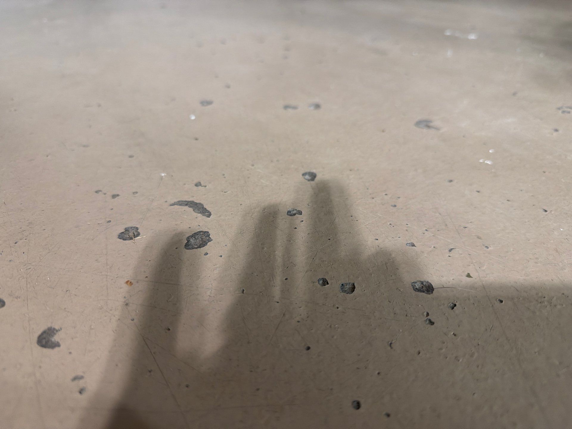 Residential Garage Floor Coating with Grey Speckled Epoxy Finish by Select Painting, Coatings & Garage Cabinets