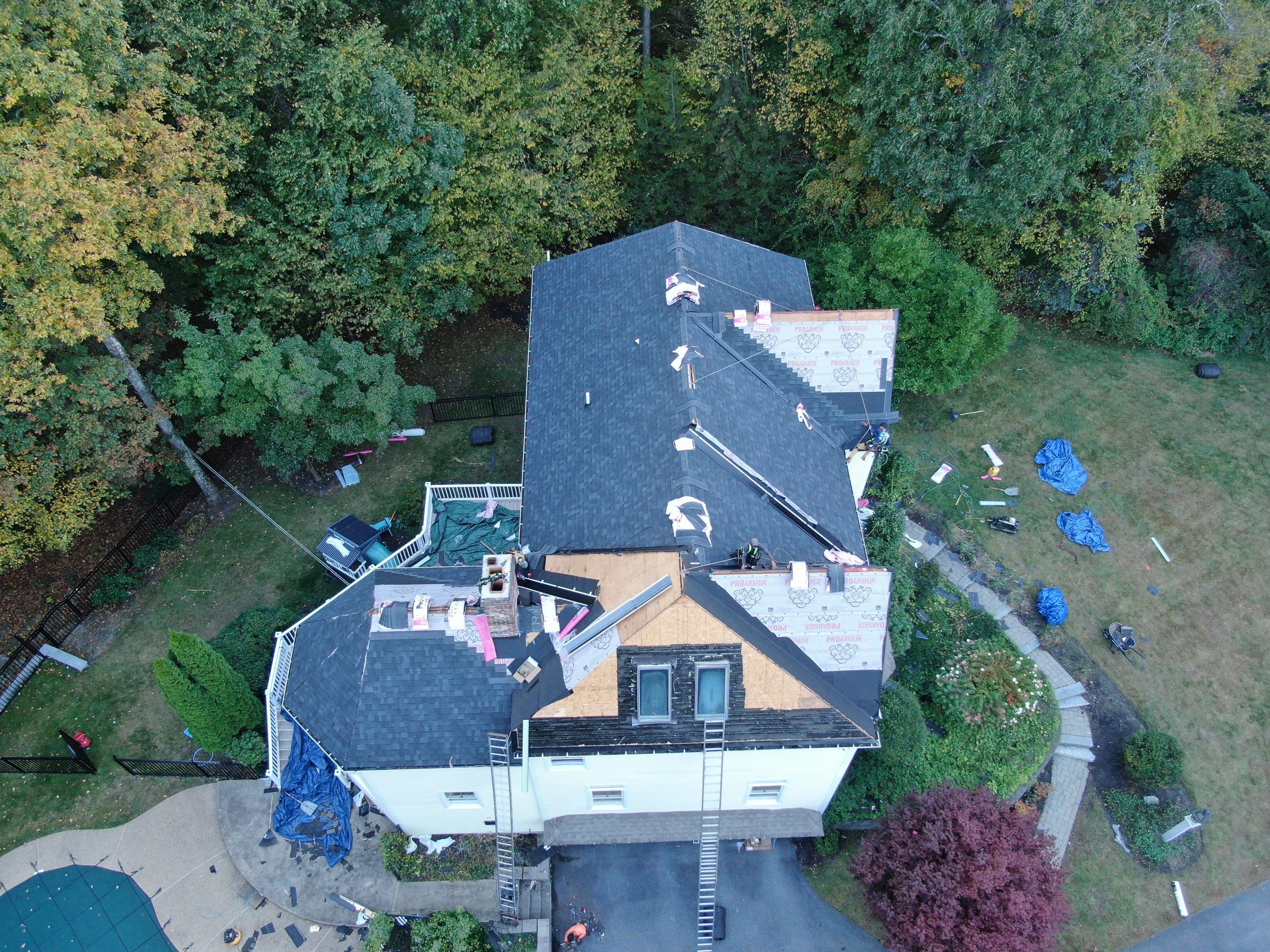 New Roof, Skylights, and Metal Accent Roof Installation in Groton by Mighty Dog Roofing of Greater Middlesex County