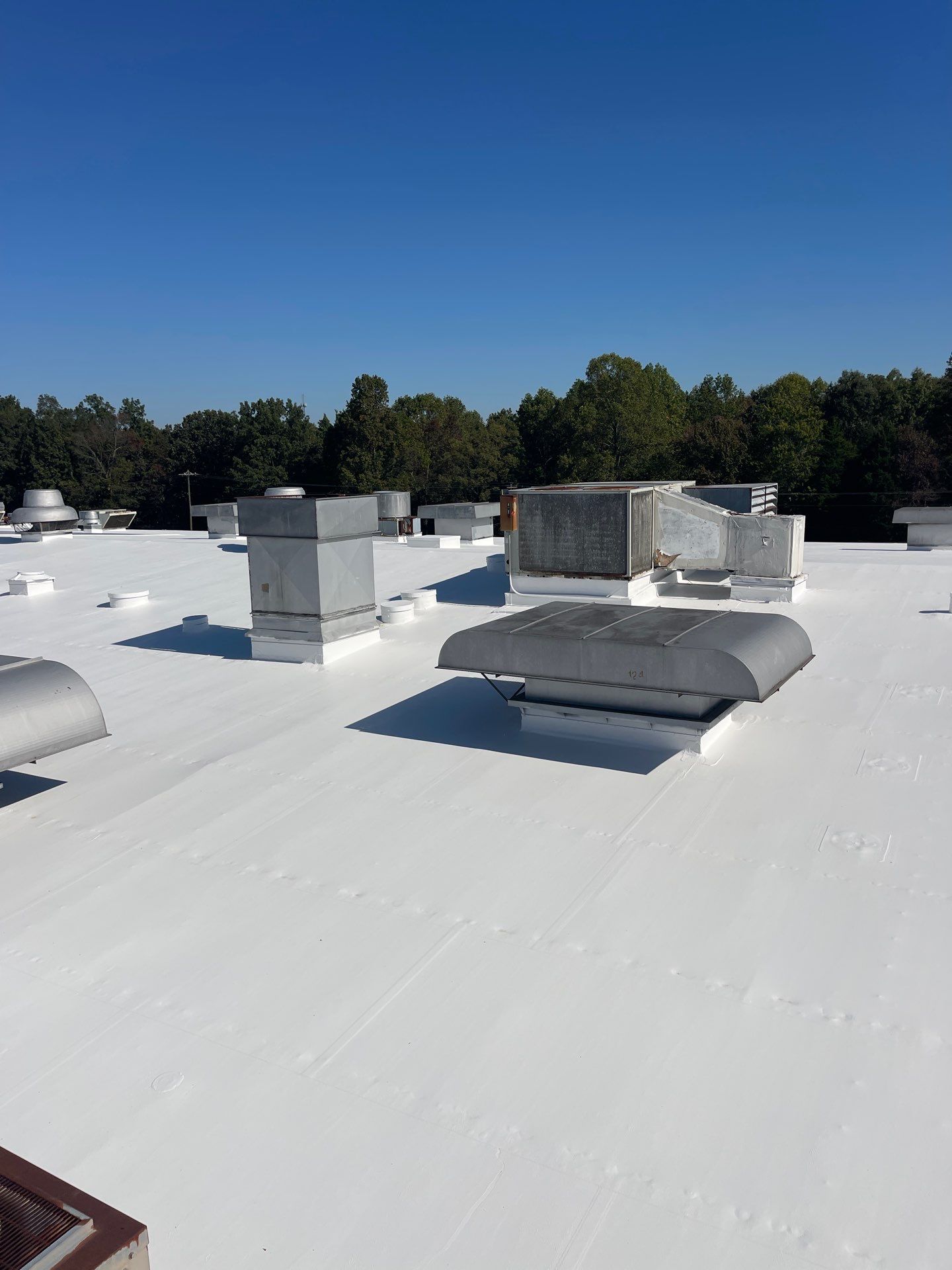 Commercial Roofing Installation using Coatings by Kentucky Commercial Roofing