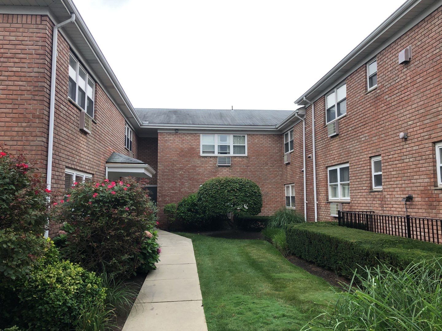Multi-Unit Apartment Complex Exterior Brick Painting Project in Hackensack by Spectrum Painting, LLC