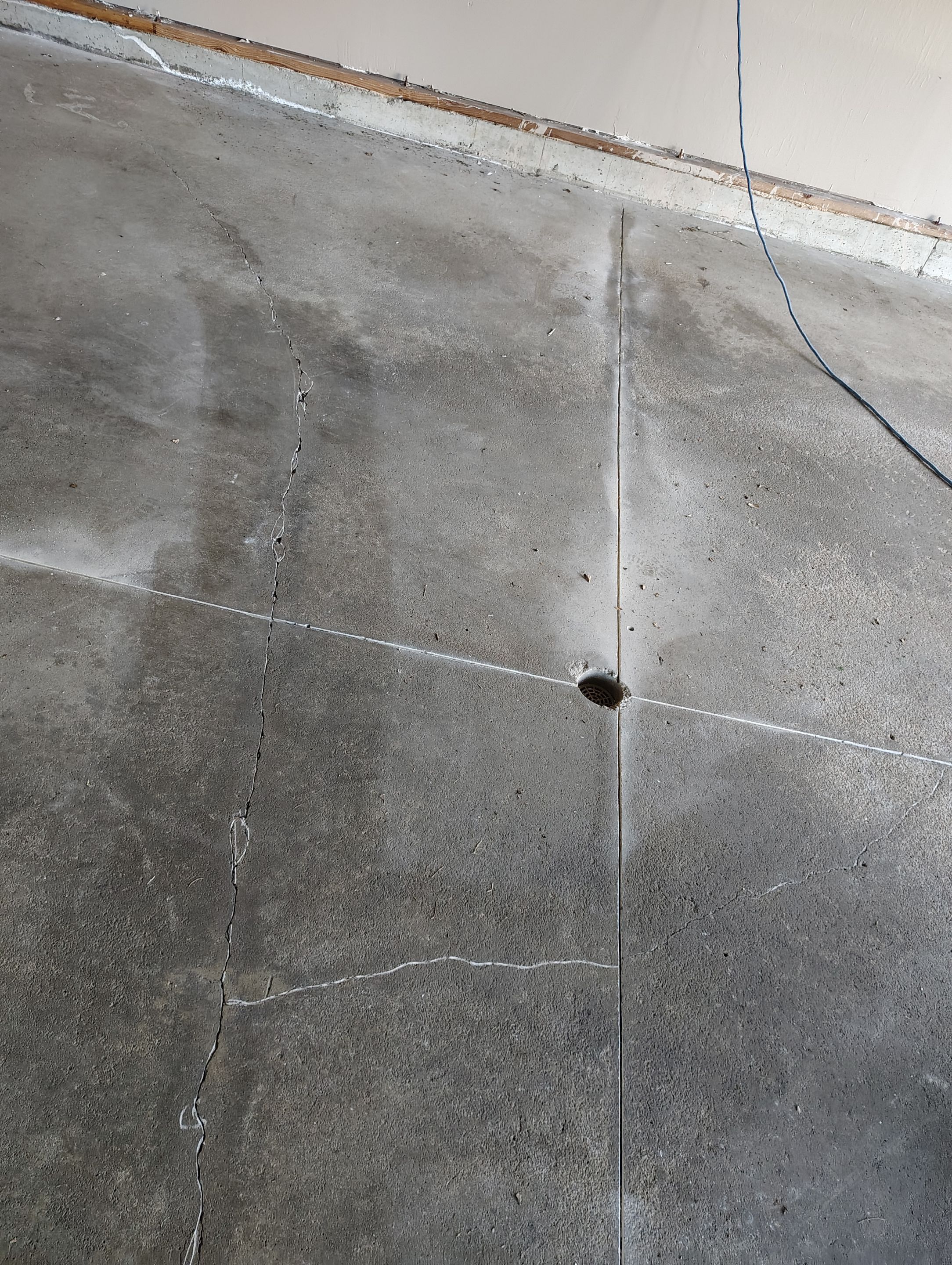 Sioux Falls Garage Concrete Repair and Epoxy Flake Floor Coating by Select Painting, Coatings & Garage Cabinets