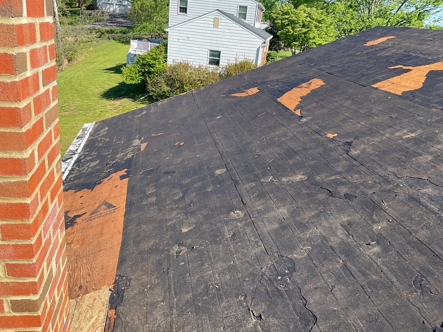 Residential Roofing Installation using Landmark Shingles Color Weatherwood by Alpha Design Services