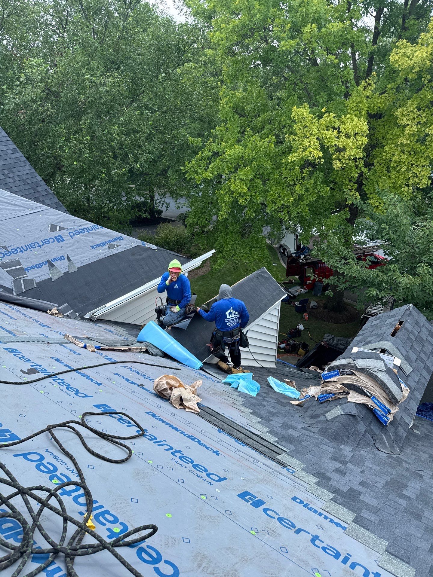New Shingle Roof & New Gutters and downspouts with covers by Alpha Design Services