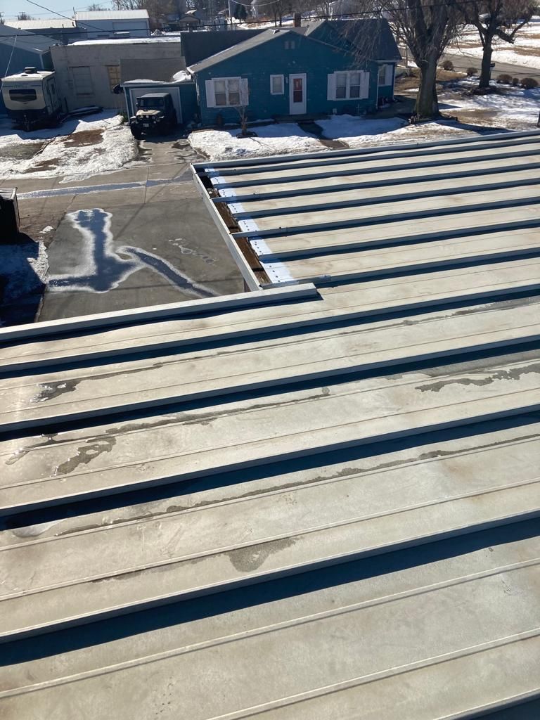 Roof Repair on a metal roof  by Grell Roofing, LLC
