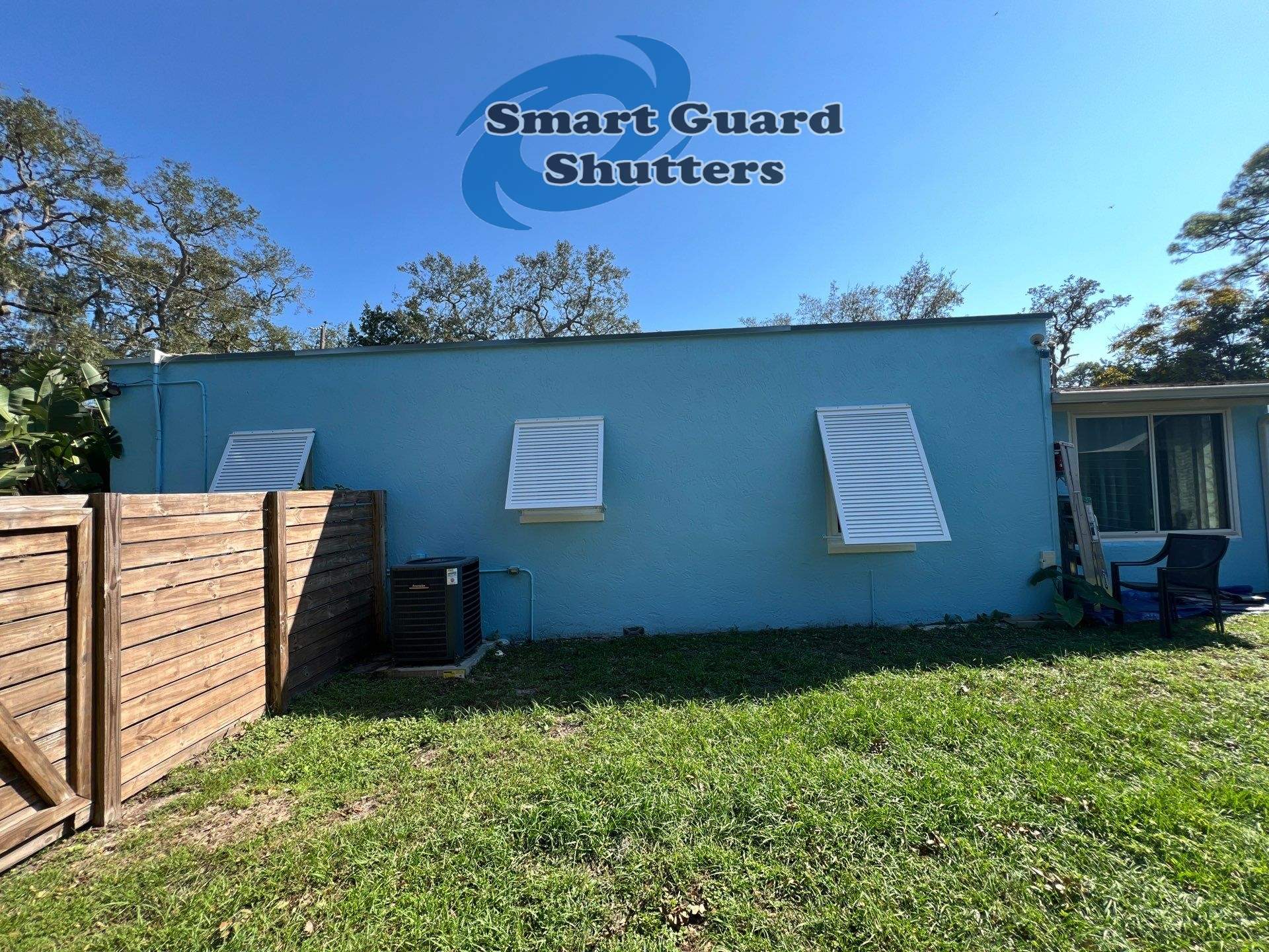 Decorative Bahama Shutters in Signal White  by Smart Guard Shutters