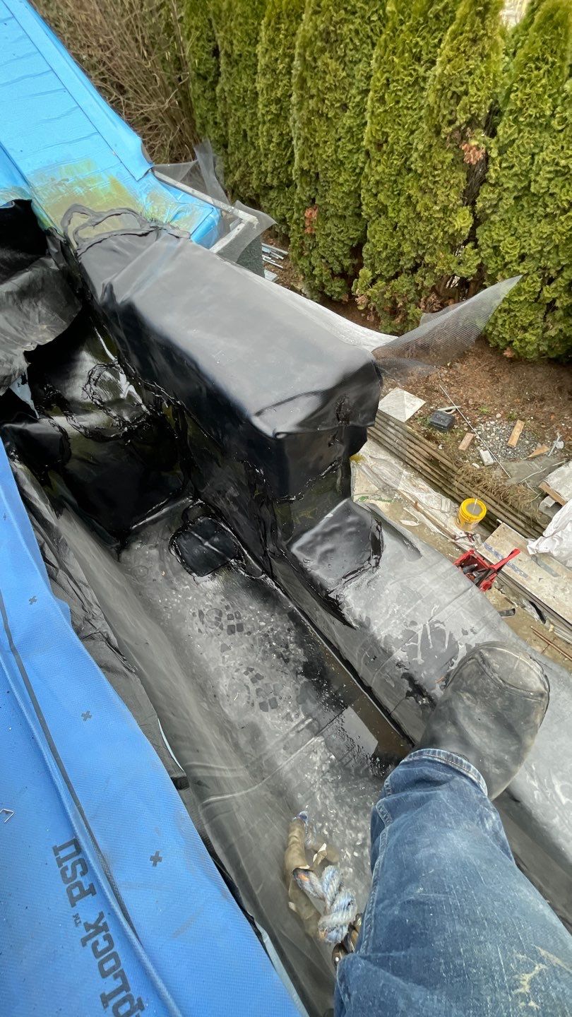 Commercial Roofing Installation using 12" Prolok metal and hidden gutters! by Top Notch Roofing Inc