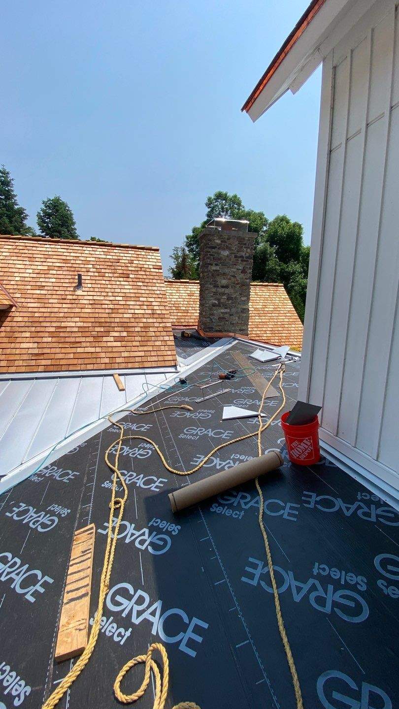 Cedar Shake Roof Replacement with Half Round Gutter Installation by Custom Installations