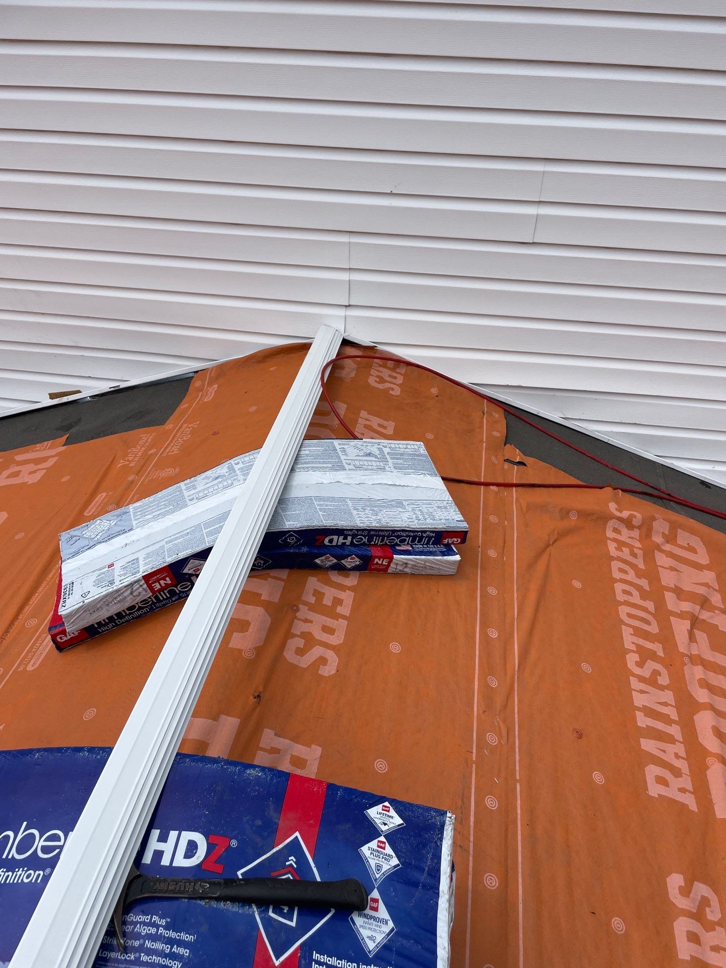 Residential Roofing Installation using GAF Timberline HDZ Oyster Grey by Rainstoppers Roofing