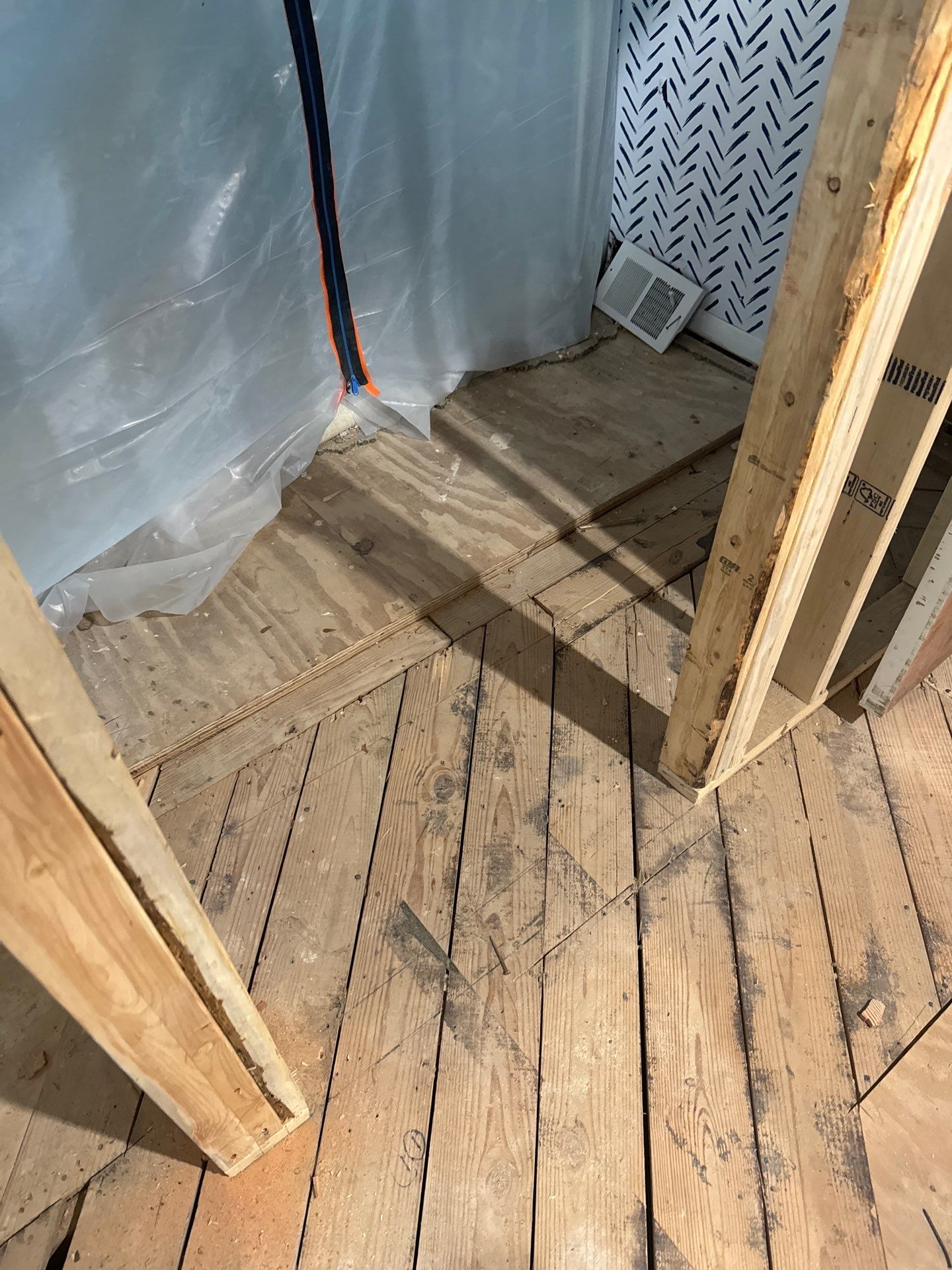 New Flooring installation using 4" White oak select grade plain sawn Ebony Stain by Ann Arbor Hardwoods