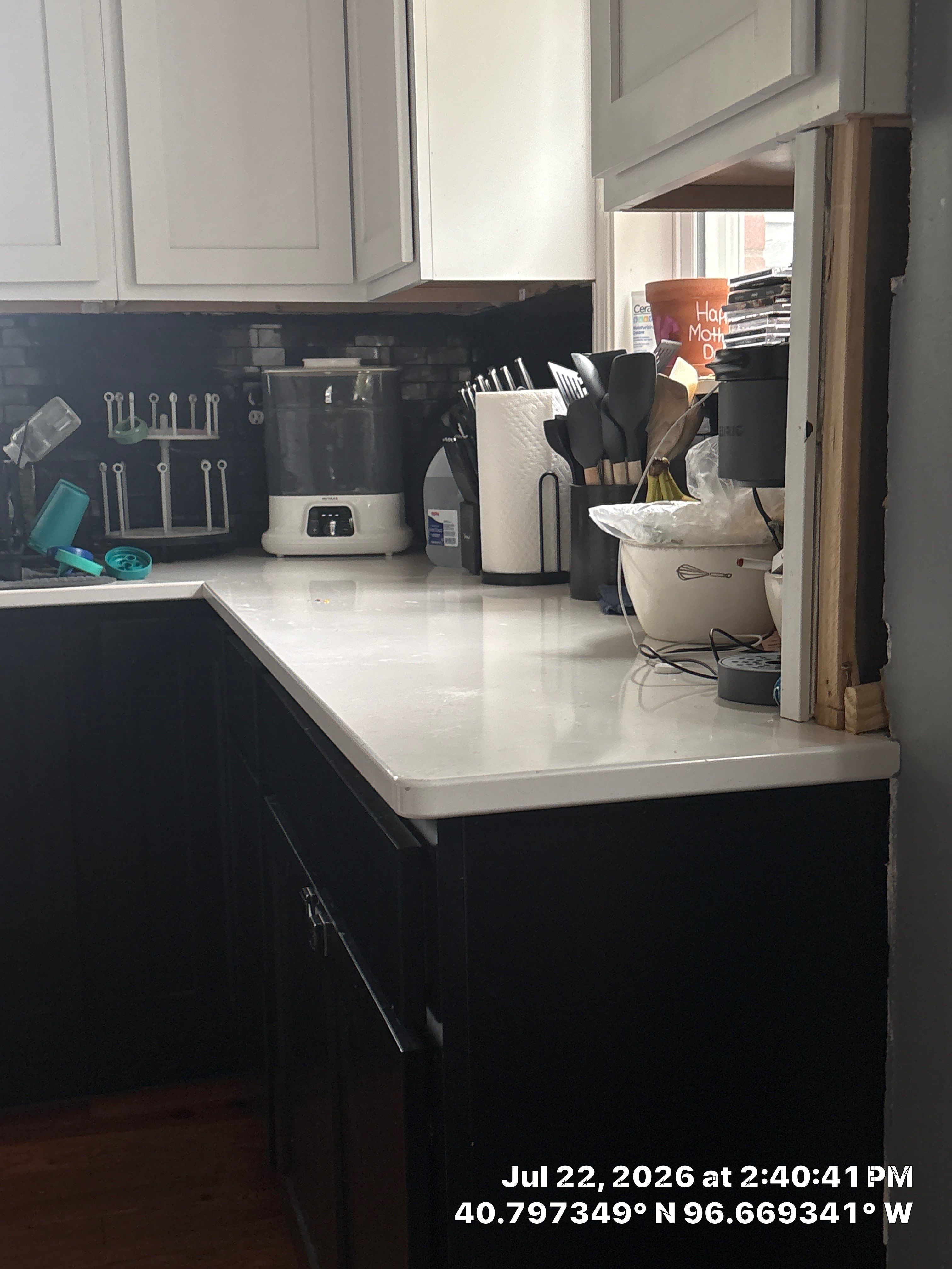 Modern Kitchen Renovation with Two-Tone Cabinetry and Quartz Countertops by CompanyCam Sales Demo