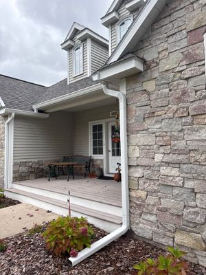 White Gutter System Installation for Traverse City Home