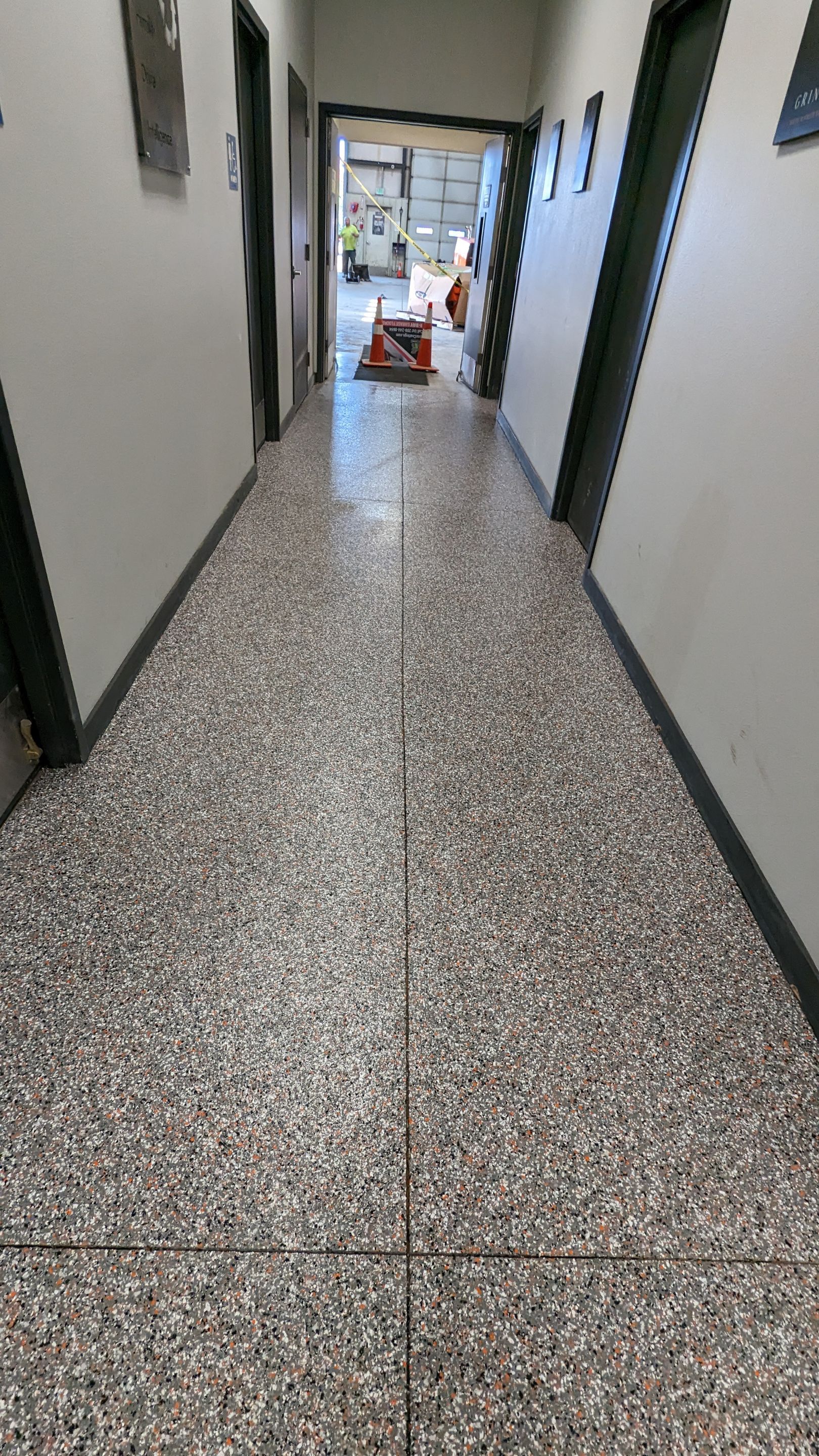 Equipment Share Commercial Floor Transformation using Smoke w/ 5% Orange by Croc Coatings, LLC