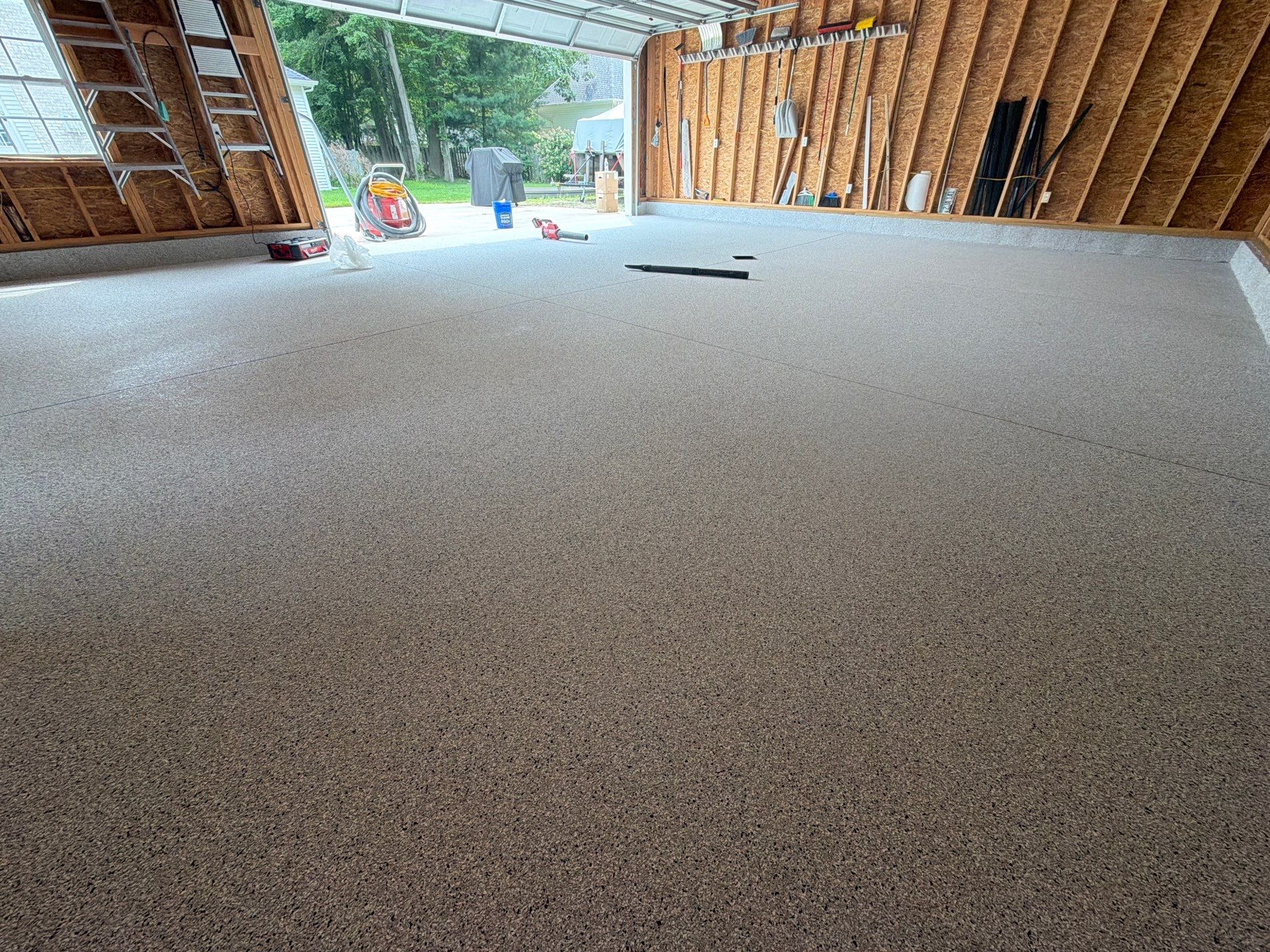 Custom Epoxy Flake Garage Floor Installation in Norton Shores by Gordon Painting