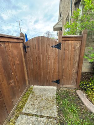 Dark Stained Privacy Fence and Composite Deck in Milwaukee