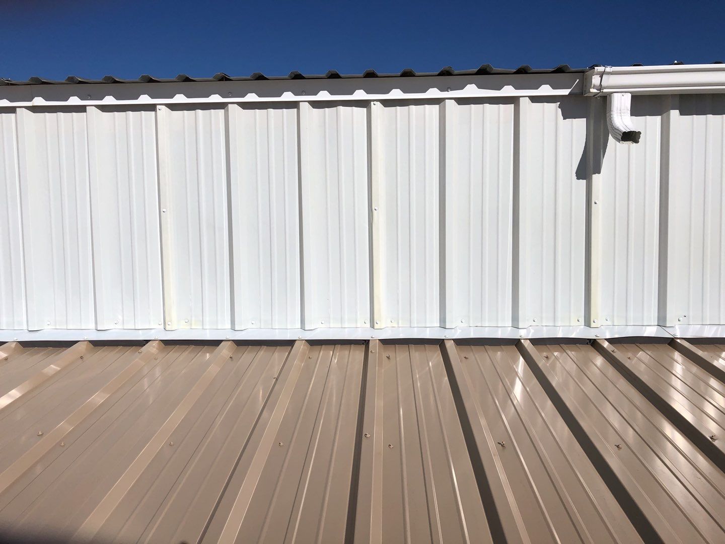 Residential Roofing Installation using Metal roofing by American Roofing & Construction LLC
