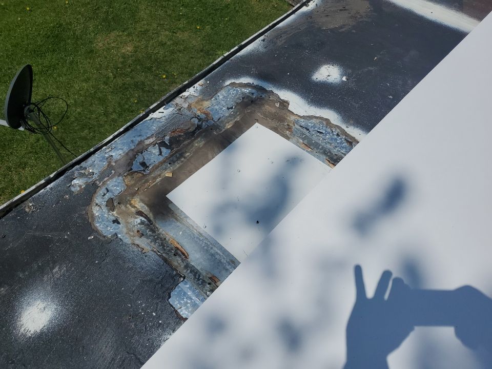 Residential Roofing Installation using 60 mil rubber roof  by Nitro Roofing and Construction