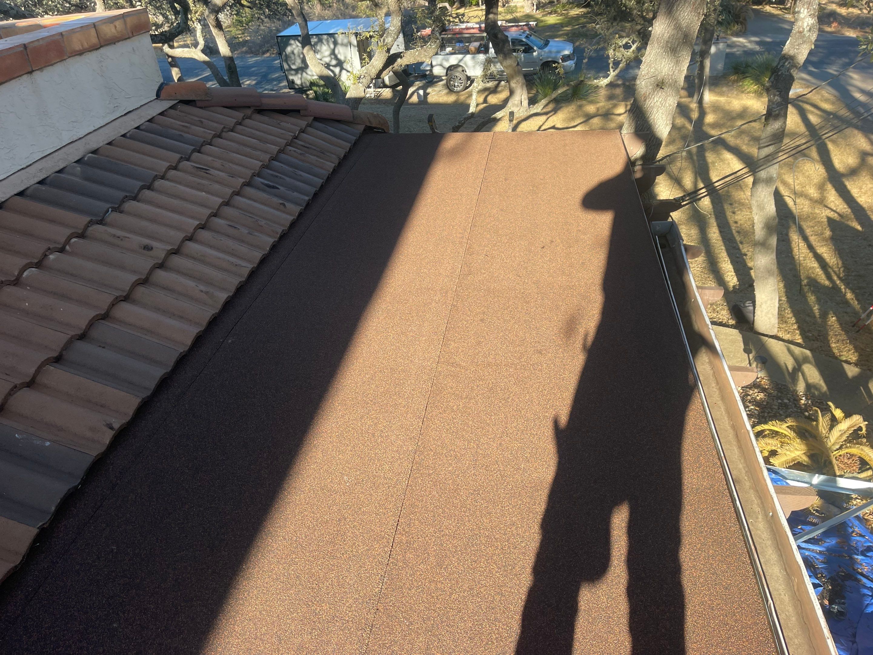 Residential Flat Roof Replacement using Mulehide Modified Bitumen Roofing by Premier Roofing and Contracting