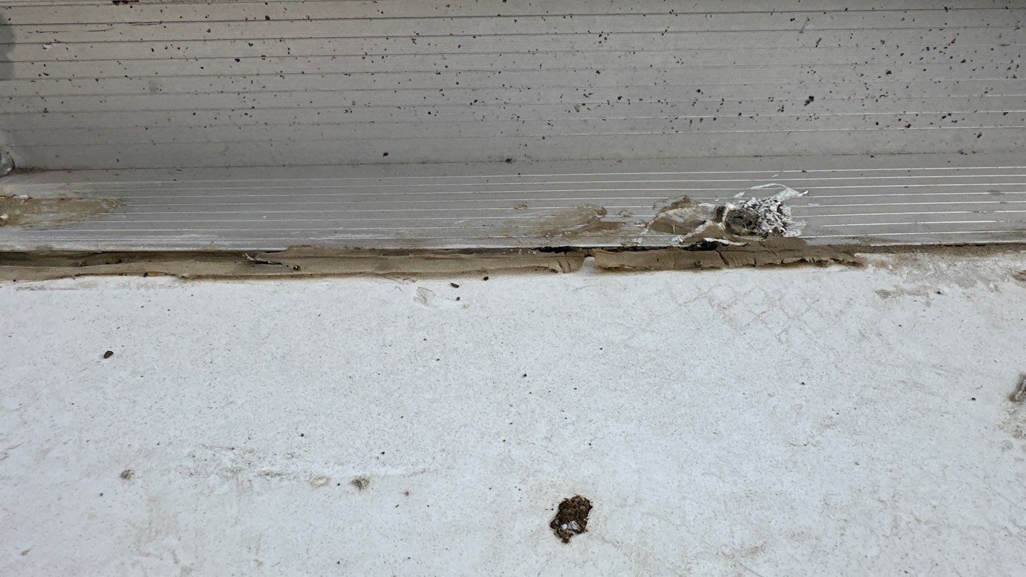 Single-ply roofing system on porch using TPO 60 mil by Straight Edge Roofing Inc