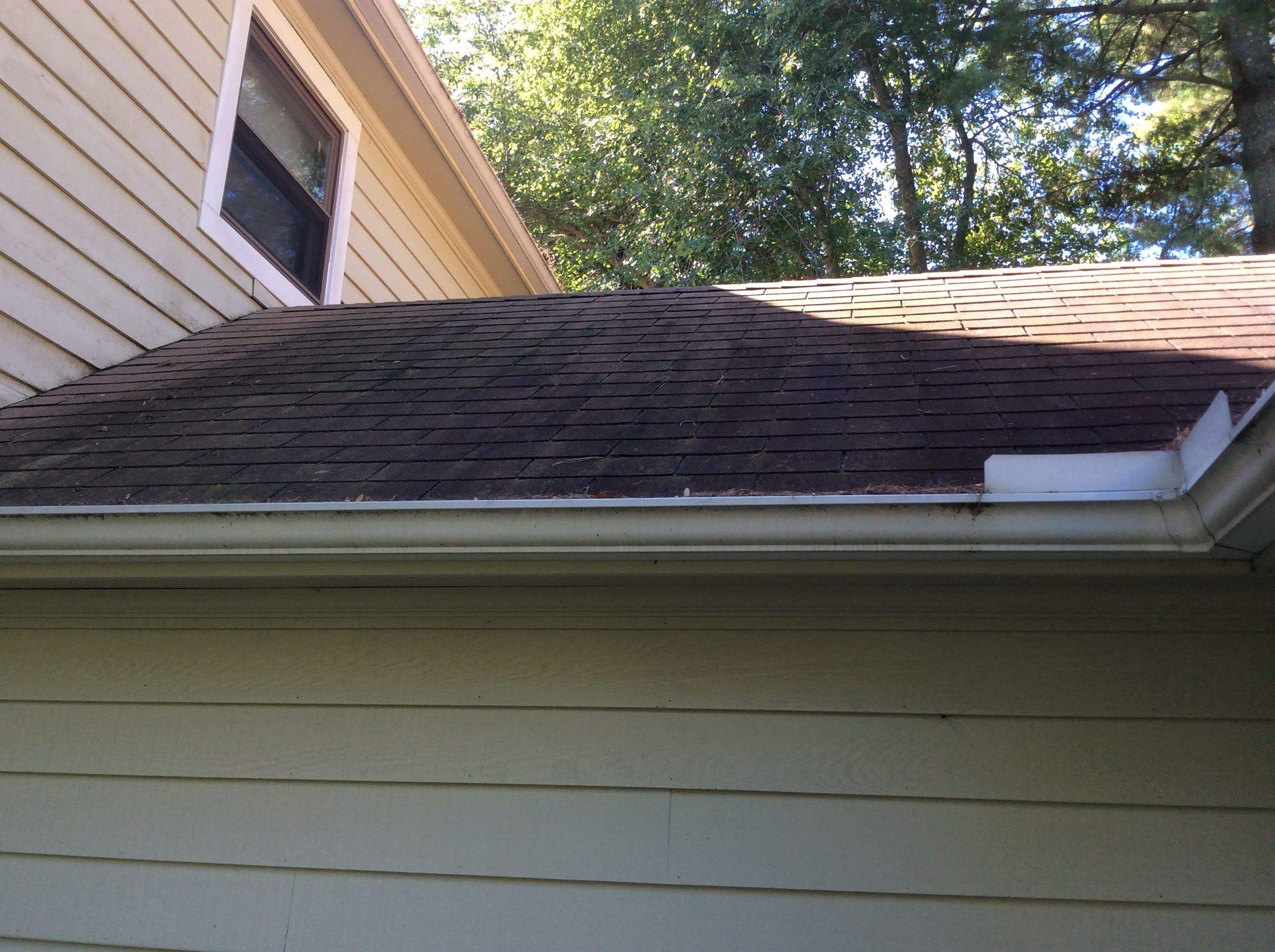 Residential Roofing Installation using Pewterwood Shingles  by Alpha Design Services
