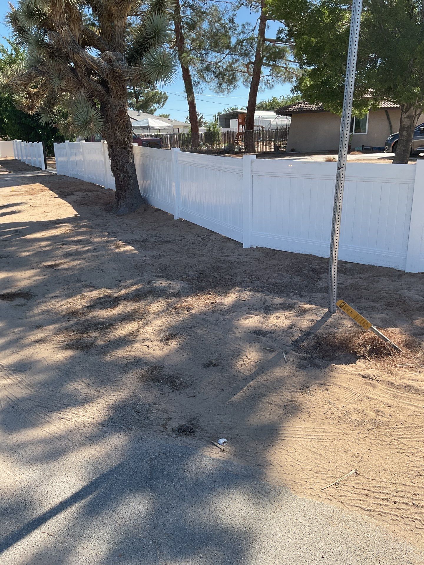 4ft White Vinyl Fence with Solar Power Motorized Gate by Fence Guys Inc.