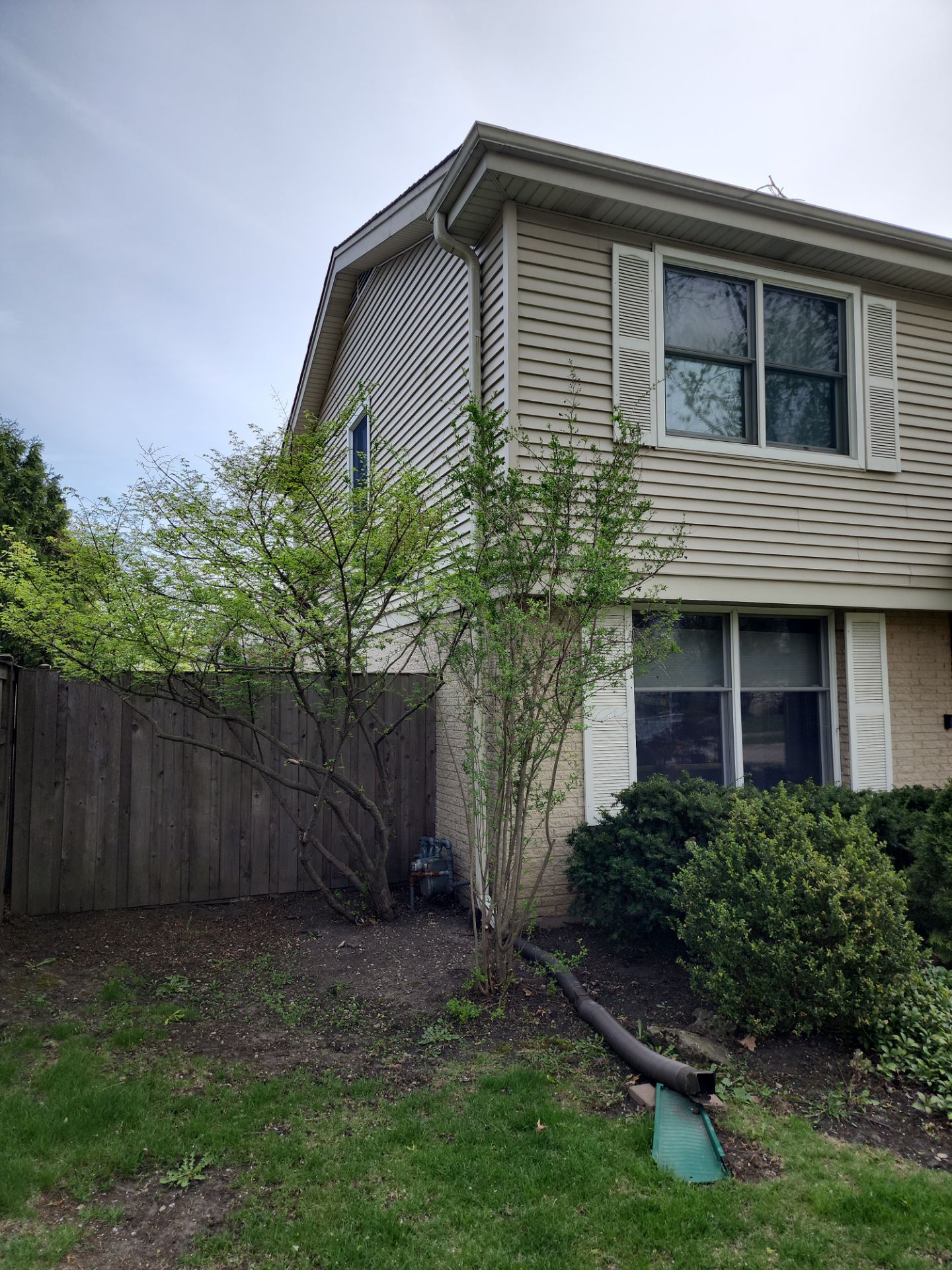 roof washing using Algaecide, soft wash soap by Northern Power Washing LLC.