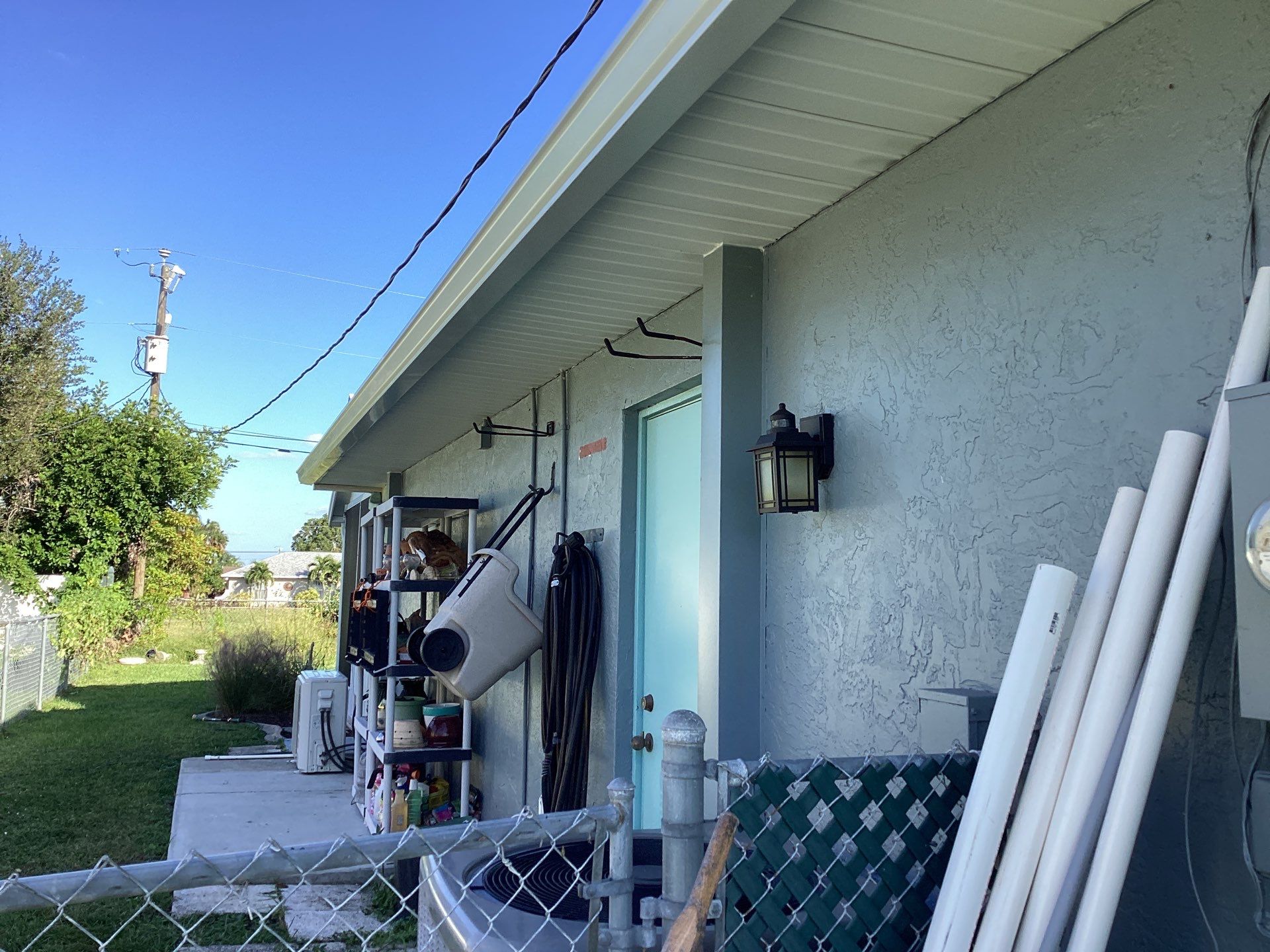 Soffit and Fascia Installation using White Vinyl Soffit in Cape Coral FL by Gutter Professors