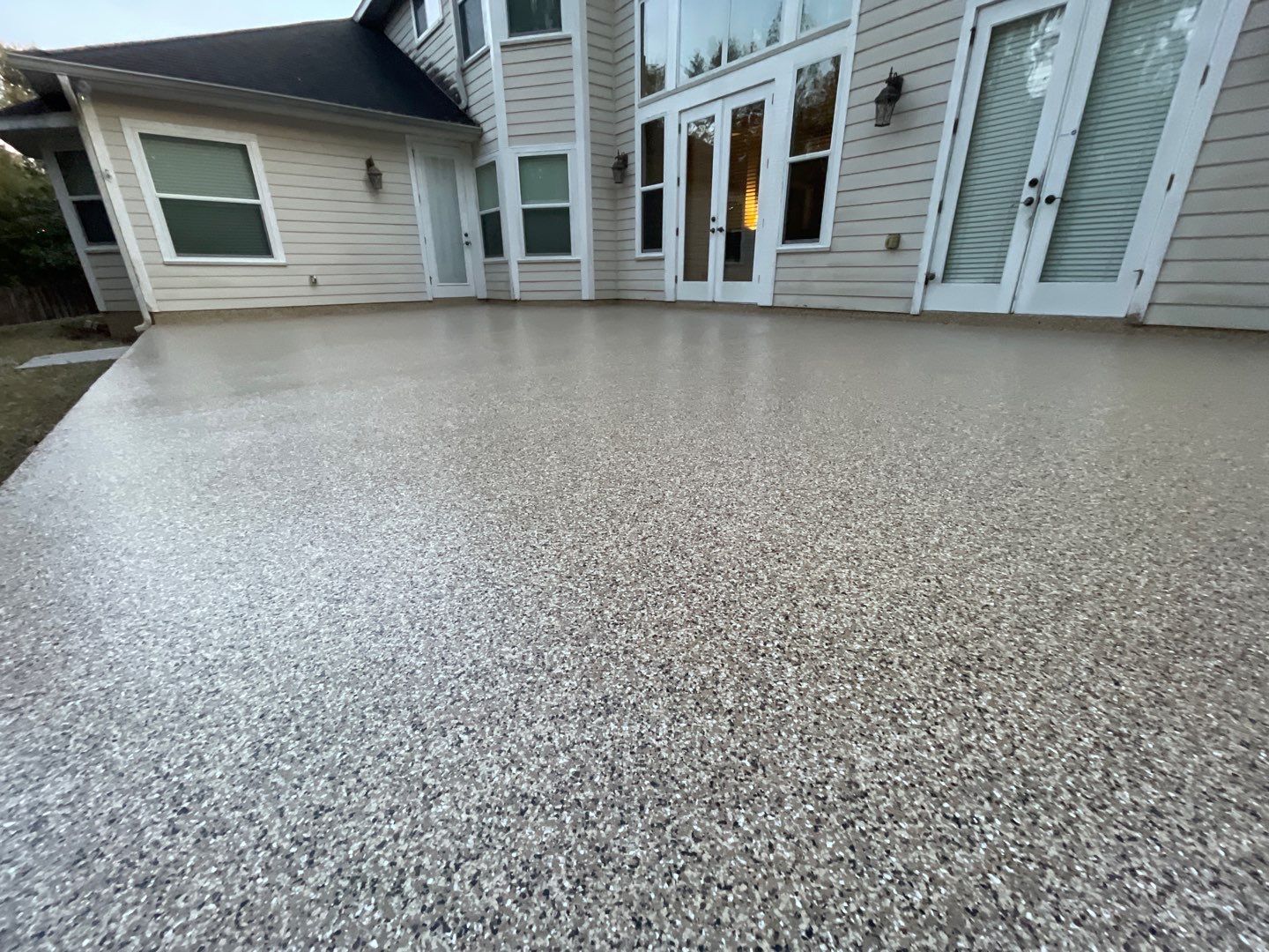Patio  in Gainesville, FL in Sandstone by Cross Creek Concrete Coatings