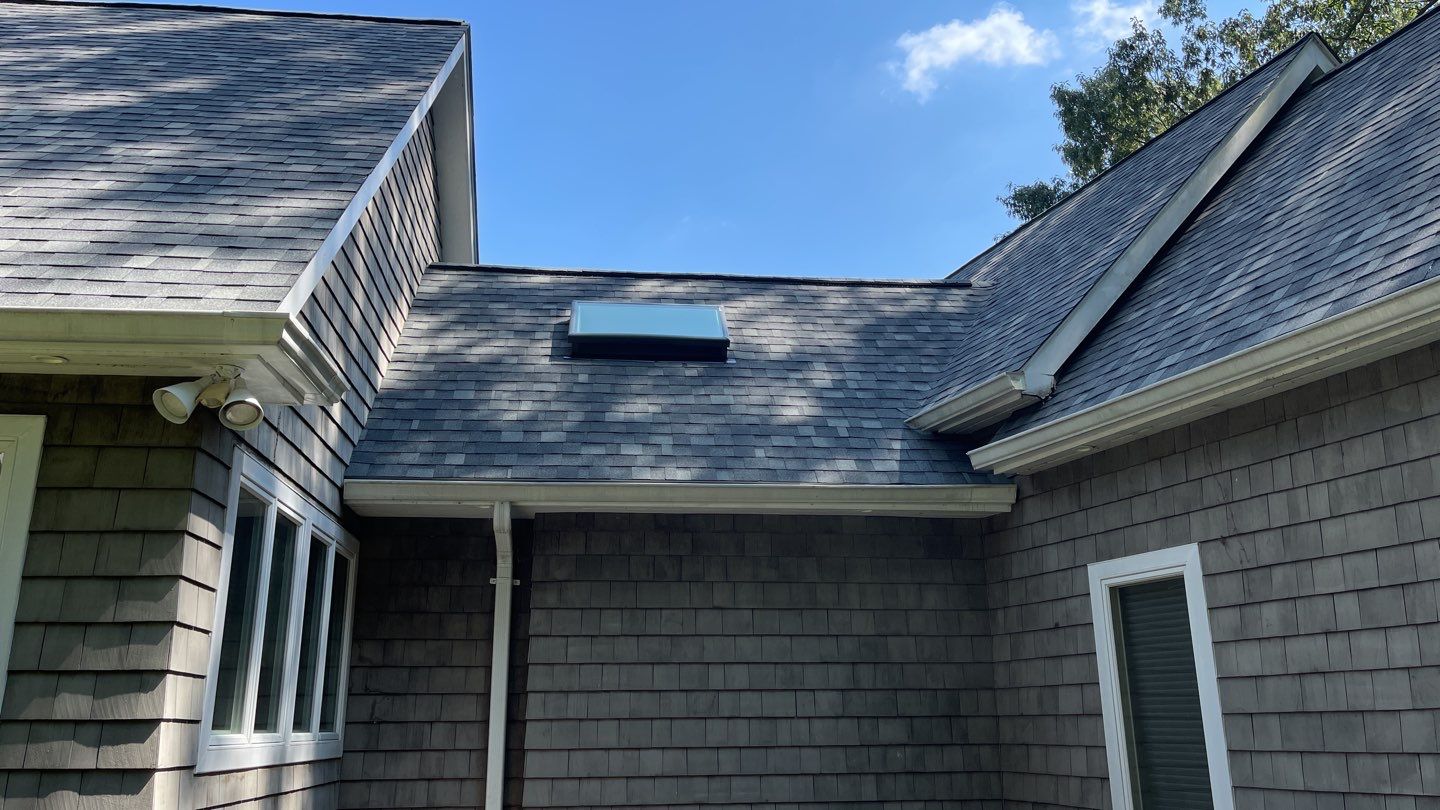 Roof Replacement using IKO Dynasty by American Home Contractors