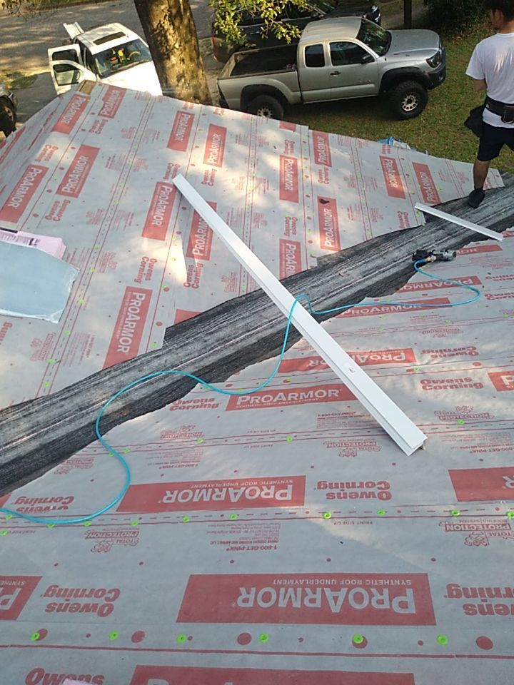 Residential Roofing Installation using Roof Replacement by American Roofing & Construction LLC