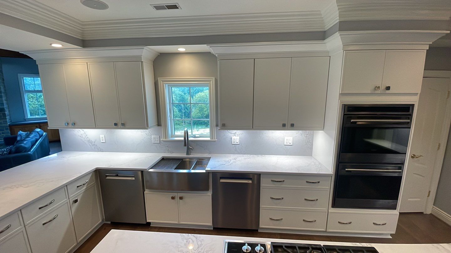 Kitchen Remodel using Fabuwood Luna Dove and Indigo Cabinetry by HomeWerkes Design & Build
