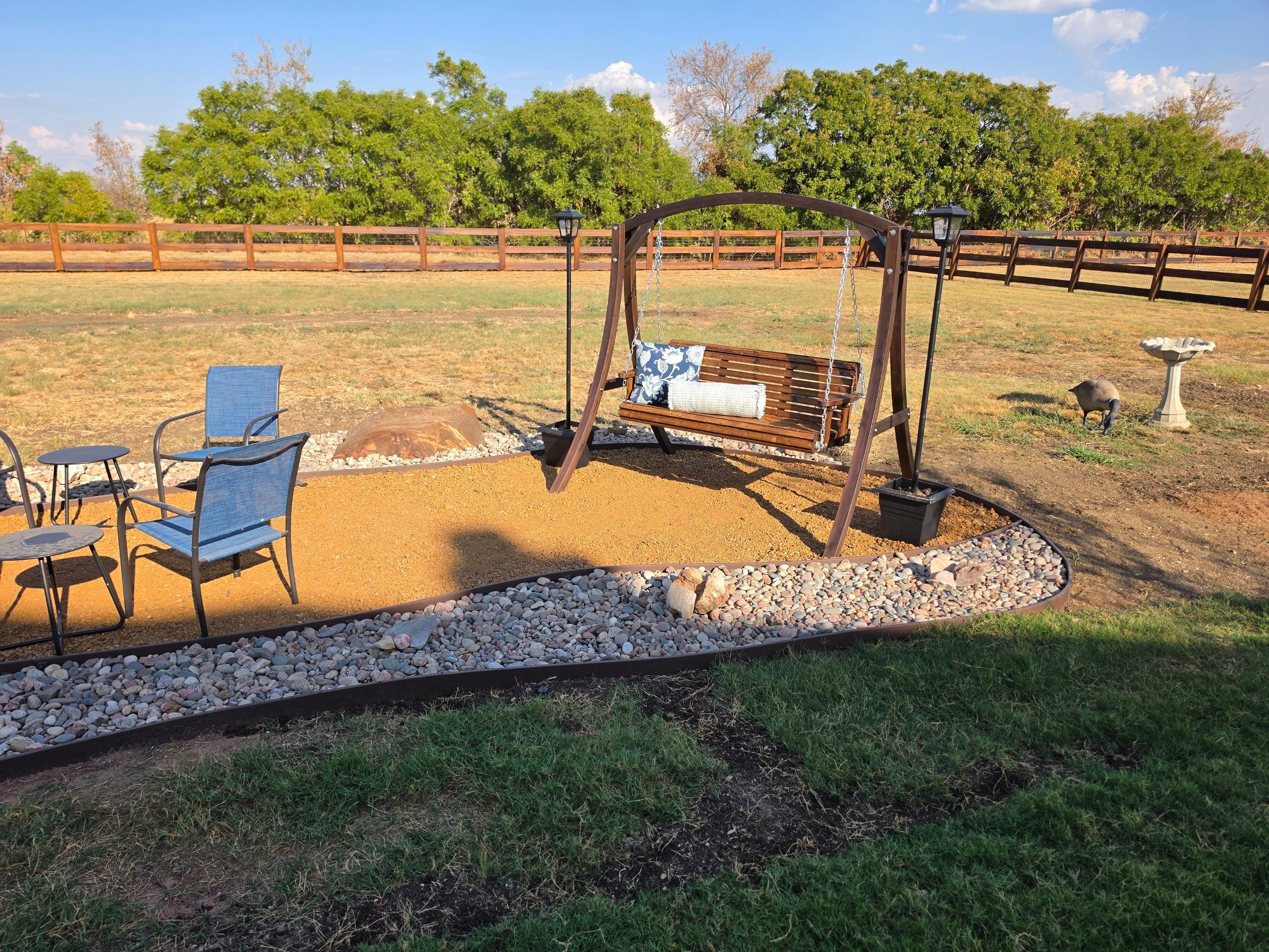 Argyle Residential Landscape Installation with Flagstone Path and Outdoor Seating by Conserva Irrigation NW Dallas
