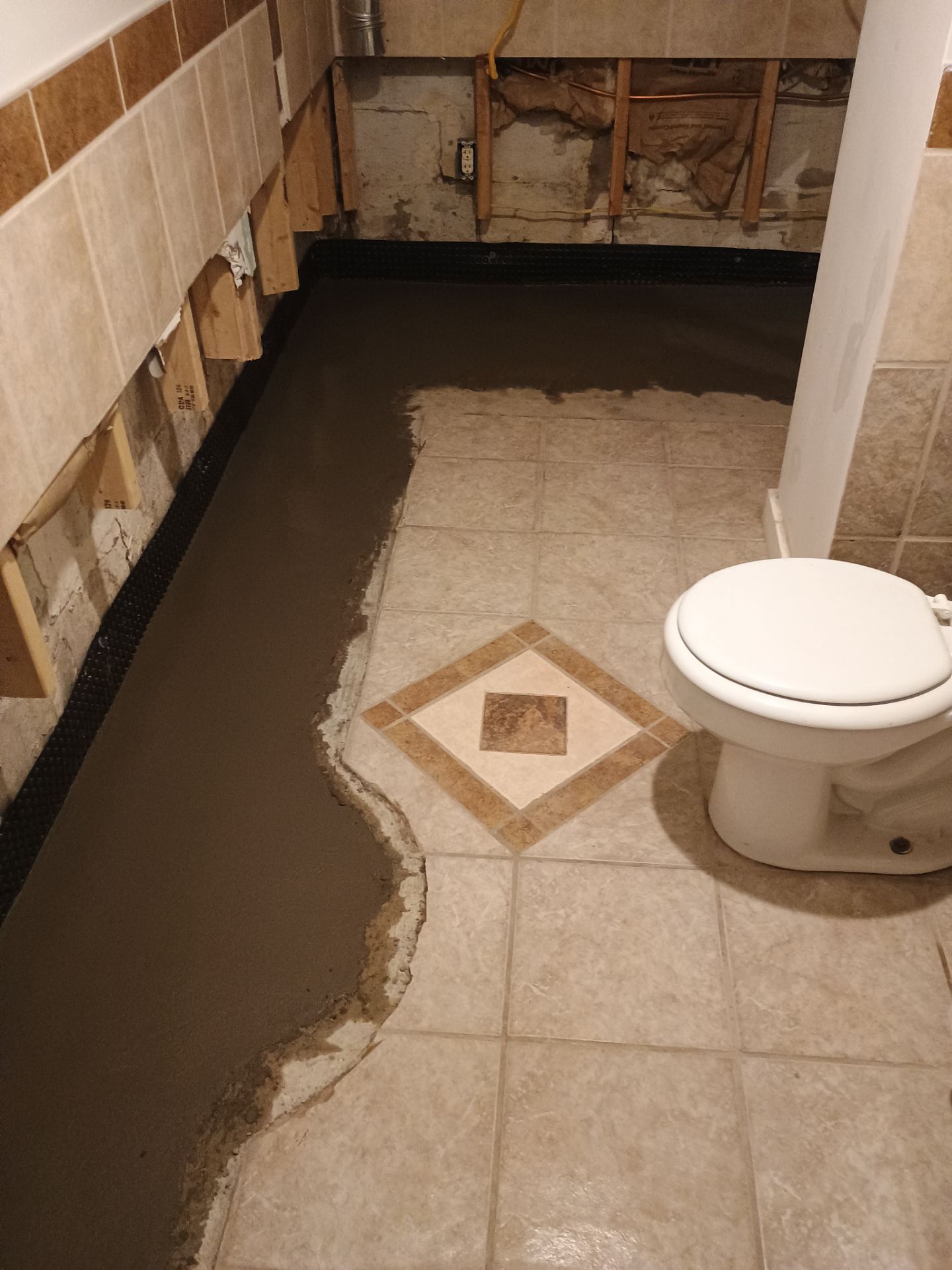 Drain Tile in Minneapolis for Kristen & Taylor by Waterproofing Northeast