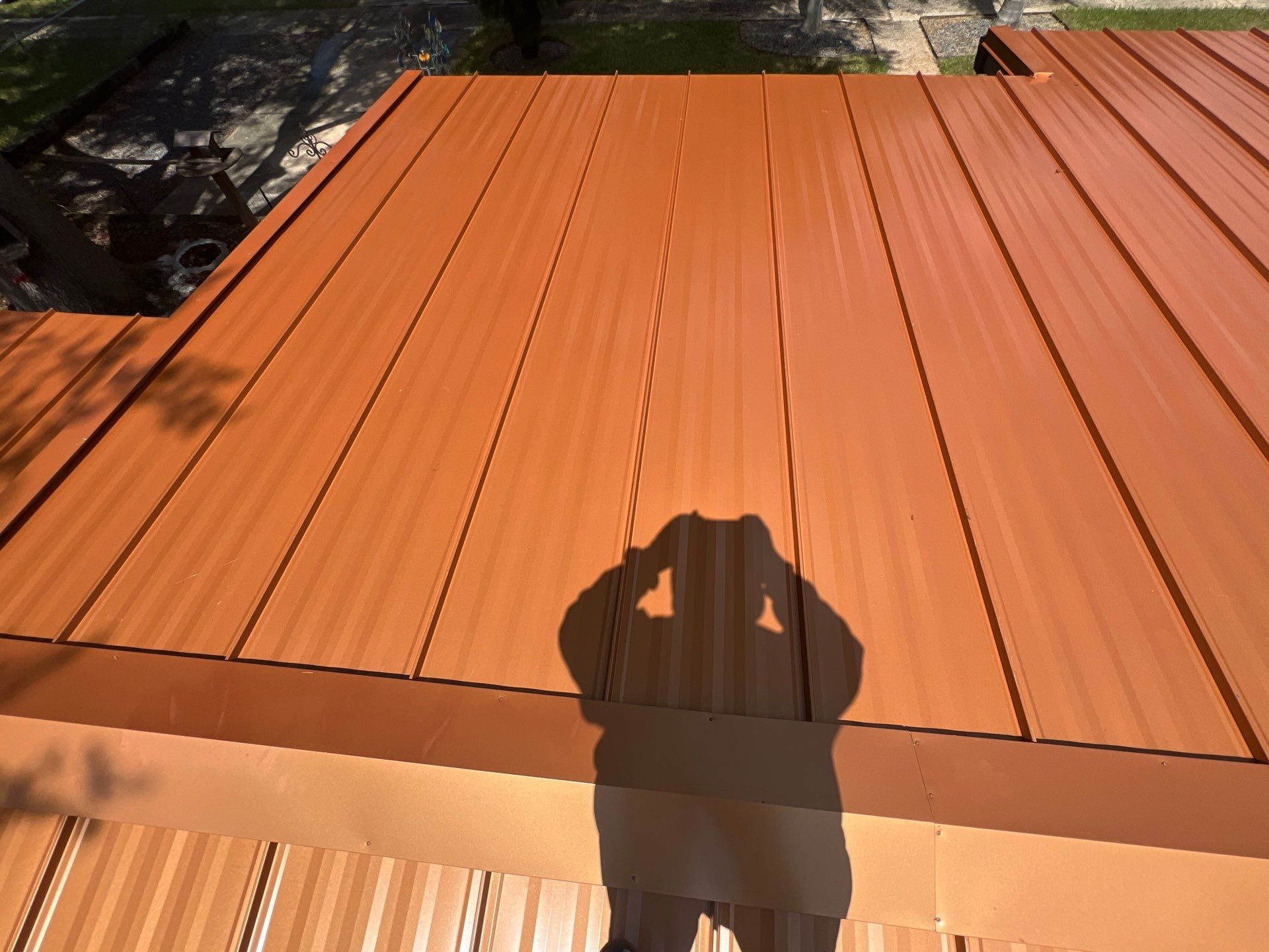 Standing Seam Metallic Copper Metal Roof Replacement in Deltona by Pinnacle Roofing Group