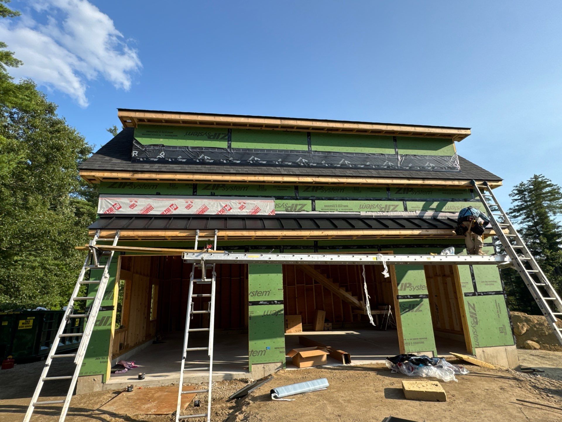Merrimack NH ADU Roof Installation with Owens Corning Onyx Black Shingles and Standing Seam Metal Accents by Compass exteriors
